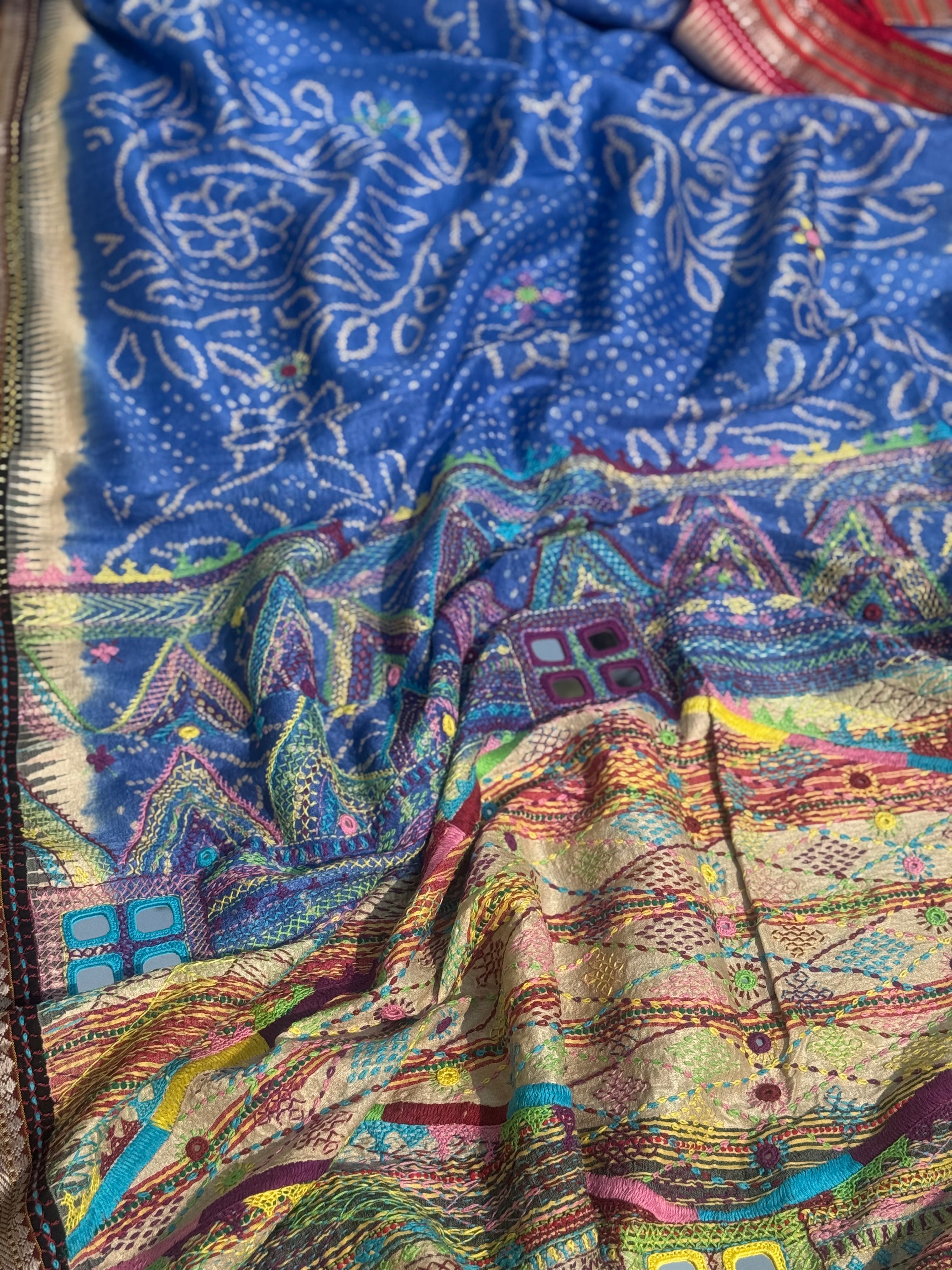 Masterpiece fusion work on handknotted bhandhej with handmade mirrorwork lambani tribal art on vidharbha tussar silk