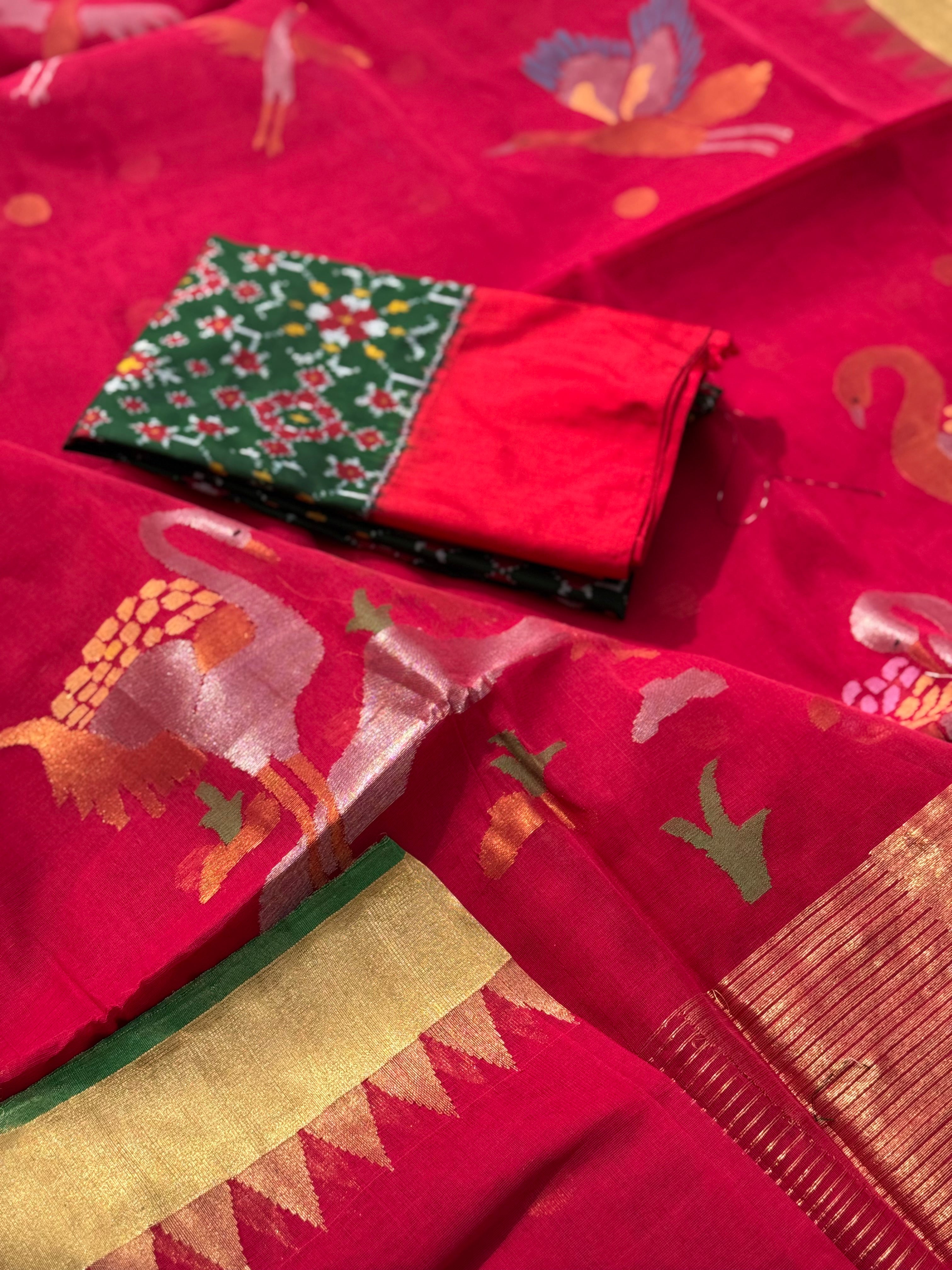 A gorgeous handspun ponduru Khadhi jamdani cotton saree in red