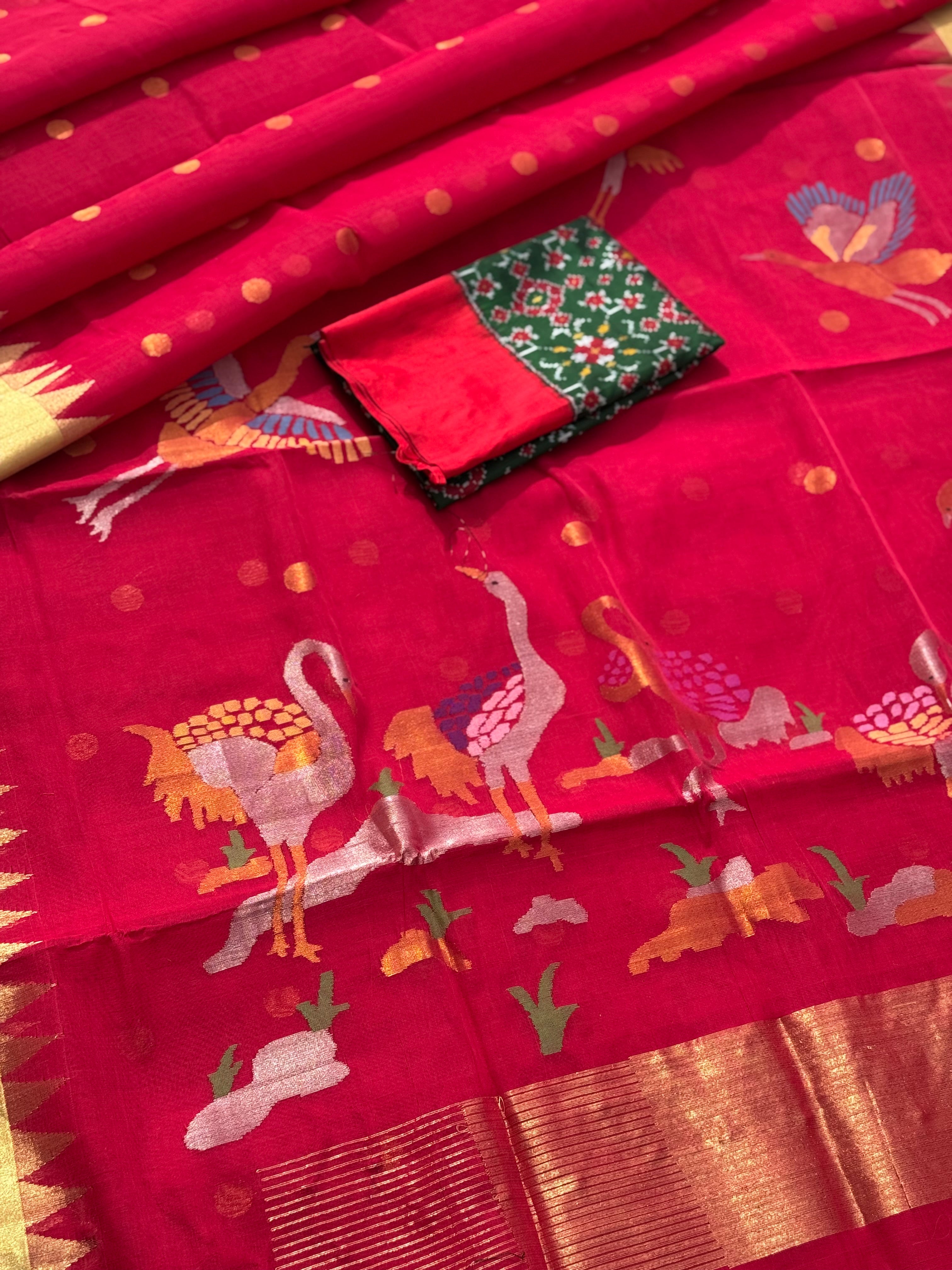 A gorgeous handspun ponduru Khadhi jamdani cotton saree in red