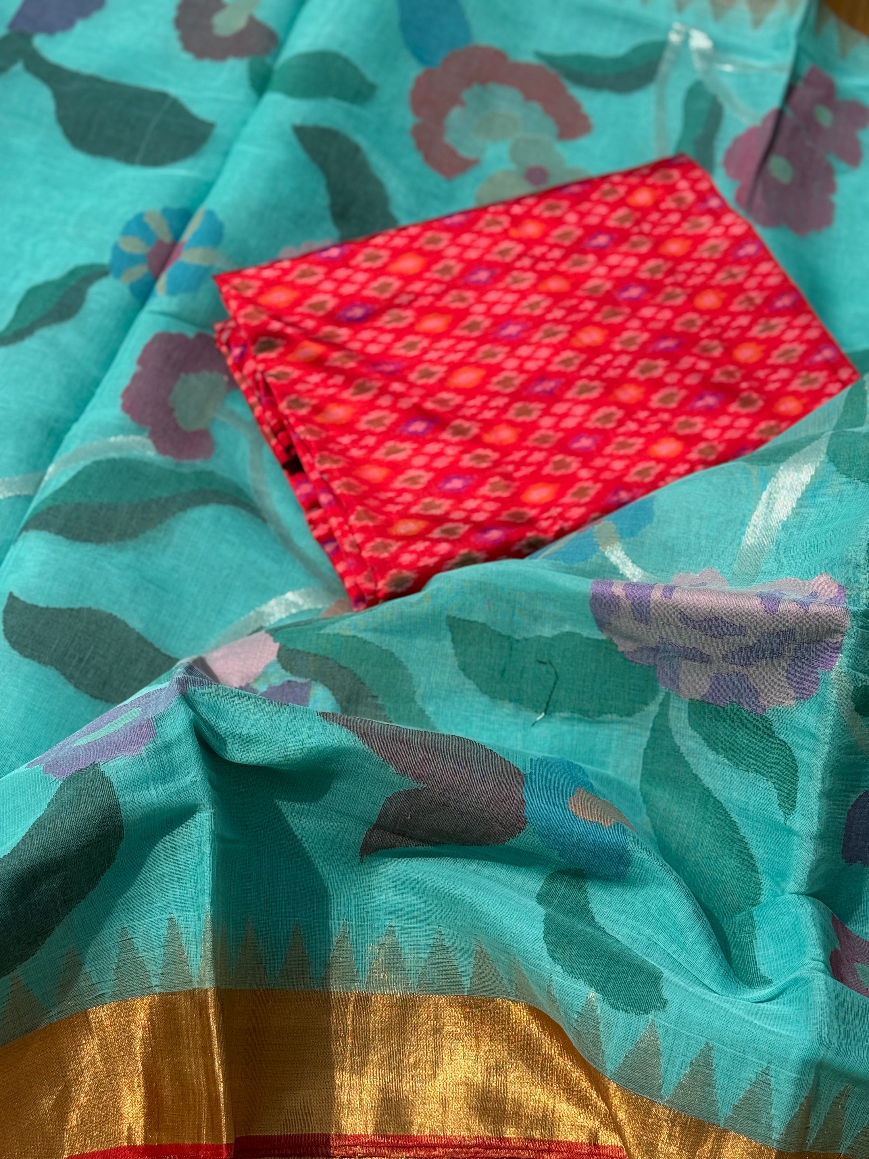 A gorgeous seafoam green shade handspun ponduru Khadhi jamdani cotton saree