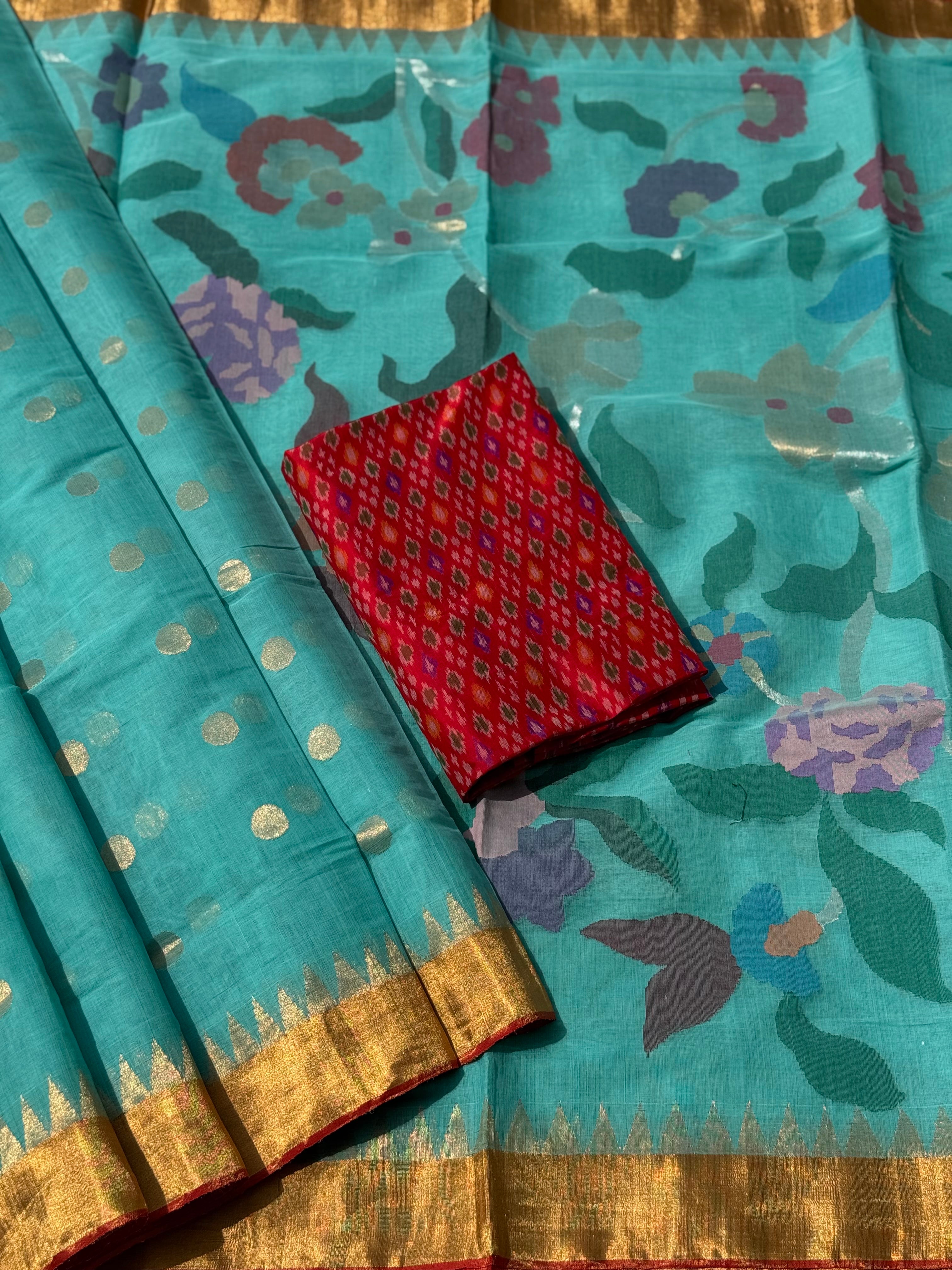 A gorgeous seafoam green shade handspun ponduru Khadhi jamdani cotton saree