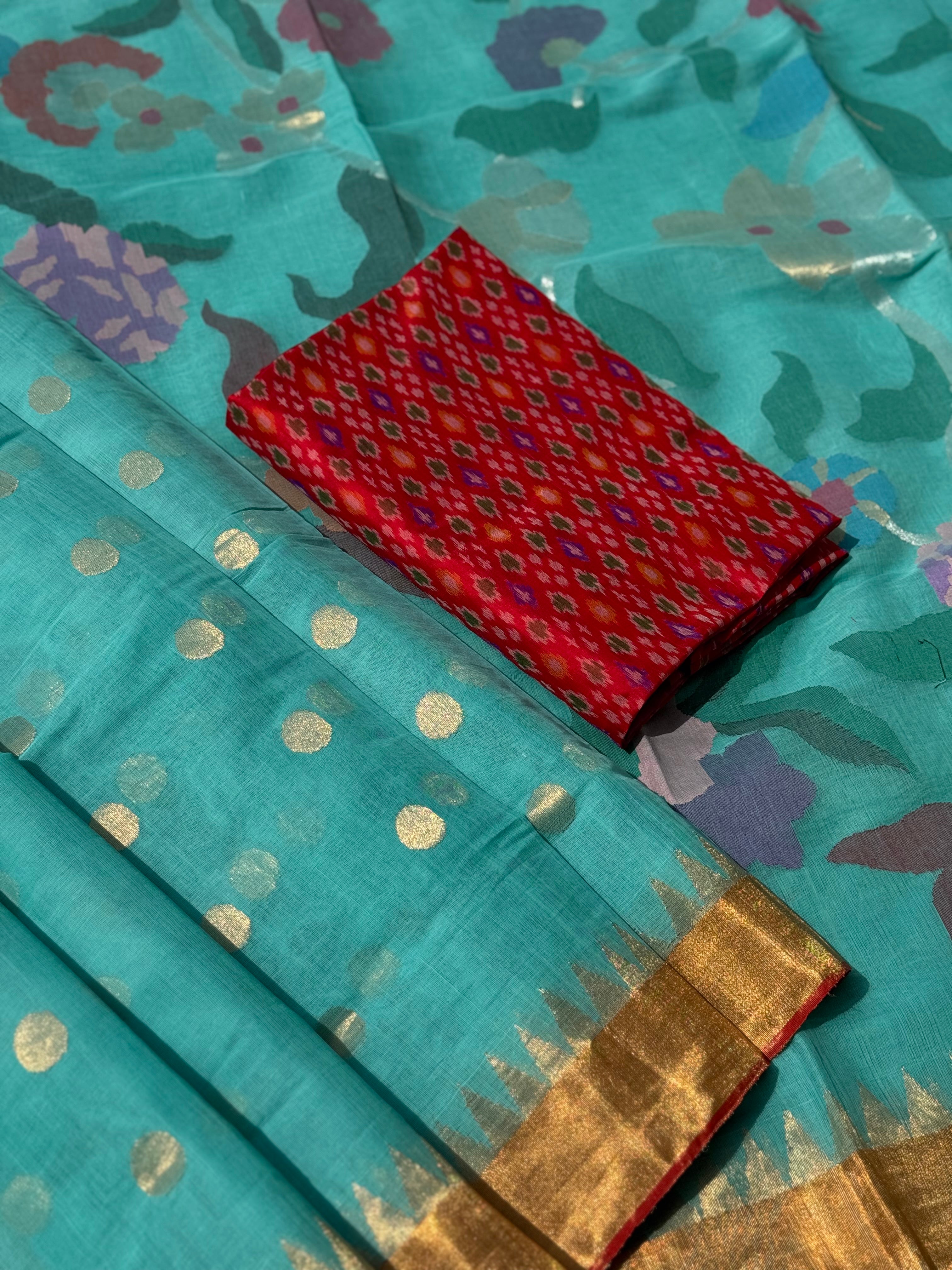 A gorgeous seafoam green shade handspun ponduru Khadhi jamdani cotton saree