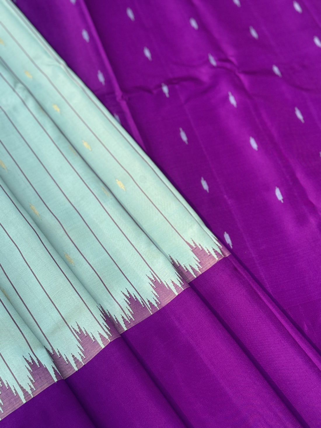 A gorgeous No Zari mint blue with magenta handwoven soft and lustrous gadwal silk saree