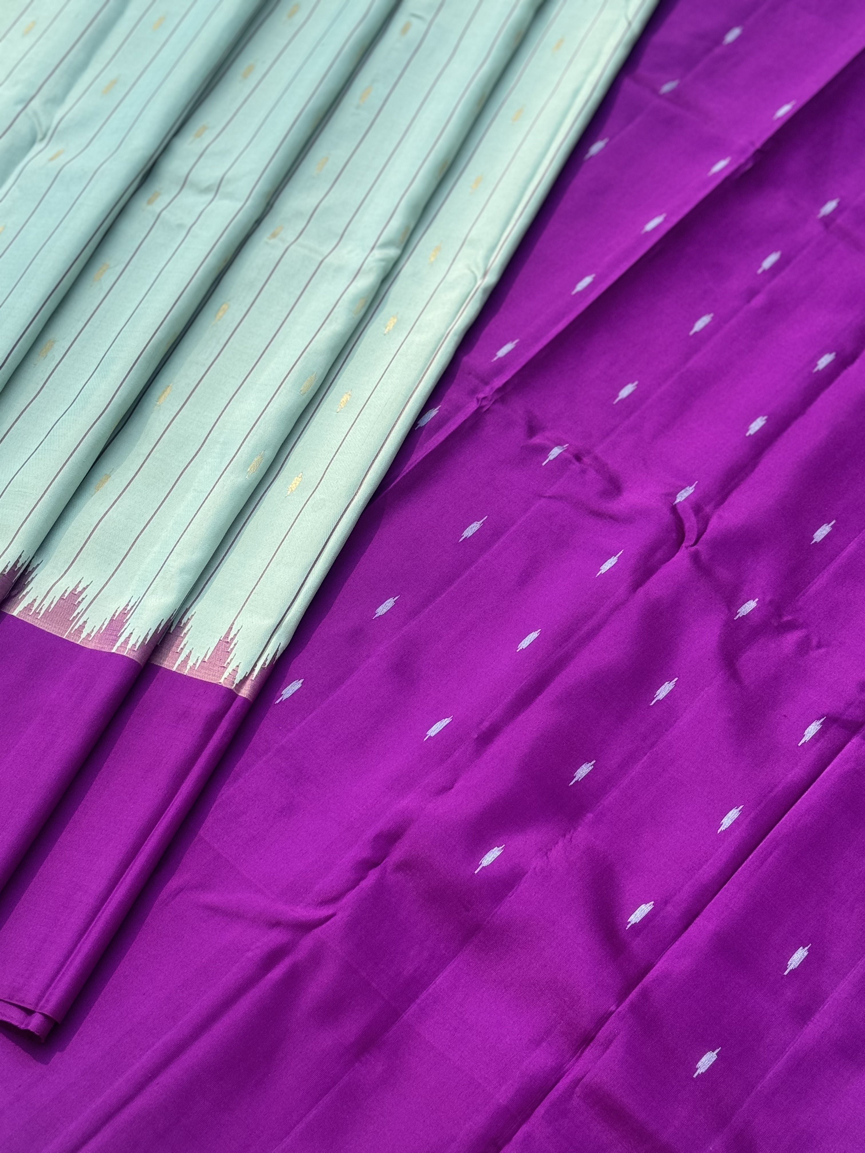 A gorgeous No Zari mint blue with magenta handwoven soft and lustrous gadwal silk saree