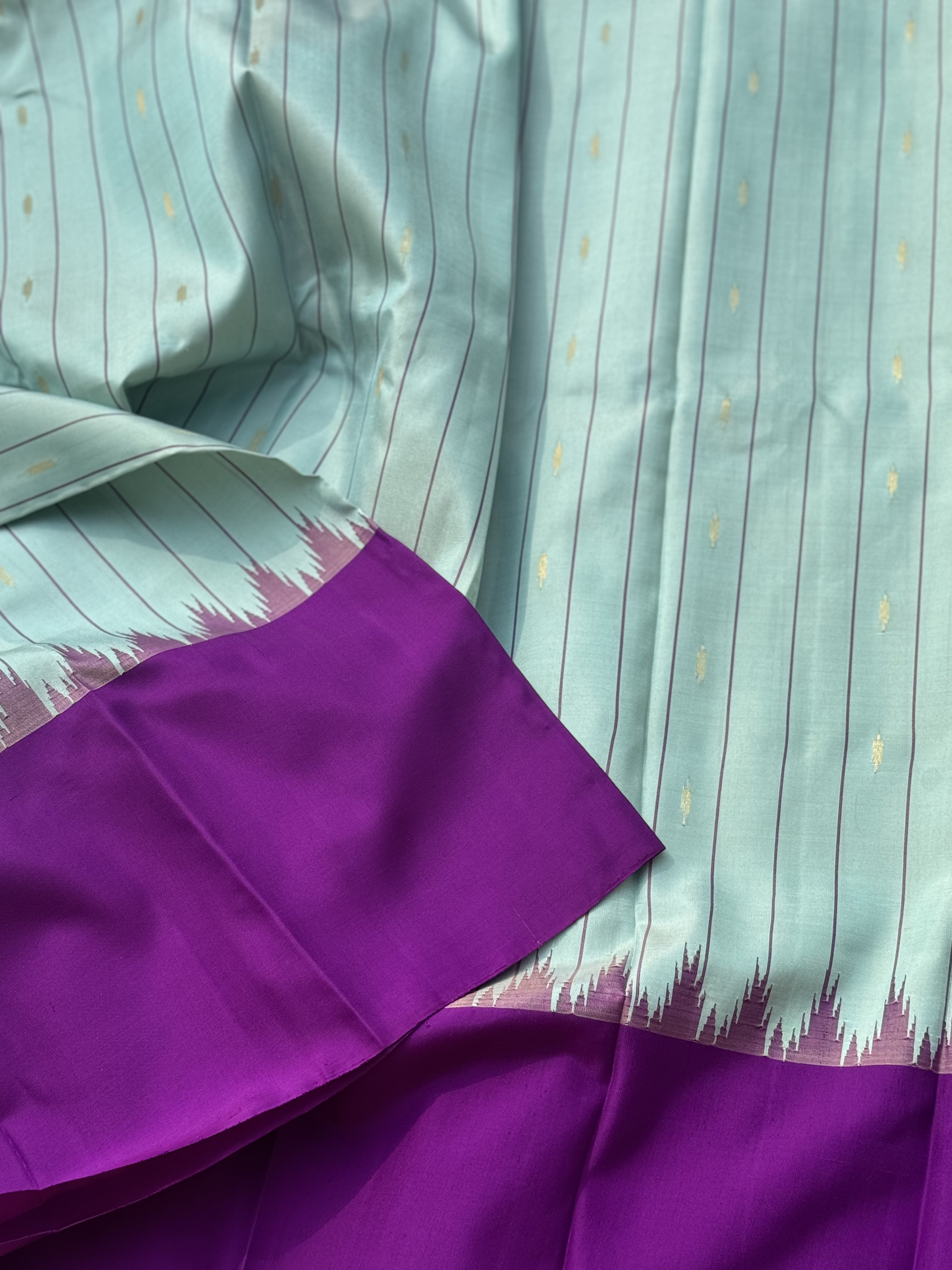 A gorgeous No Zari mint blue with magenta handwoven soft and lustrous gadwal silk saree