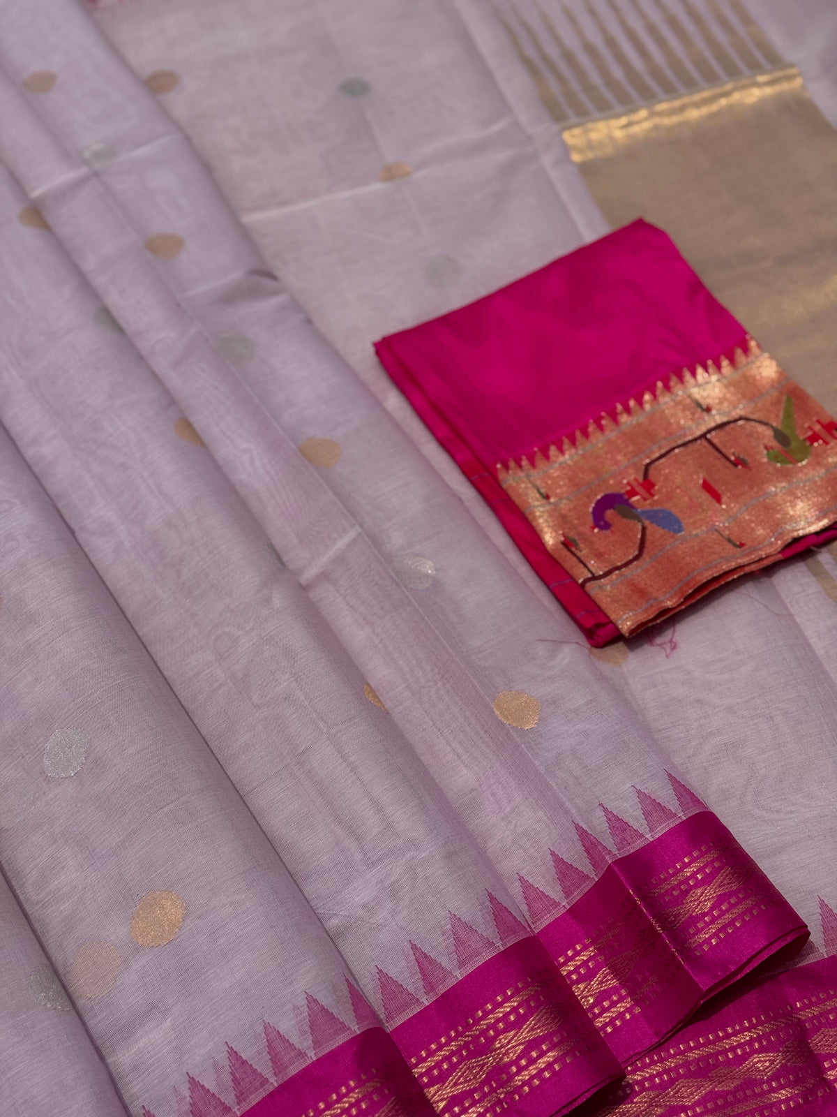 Handspun and handwoven ponduru Khadhi cotton jamdani saree with silk border in contrast pink and lilac jacquard weave