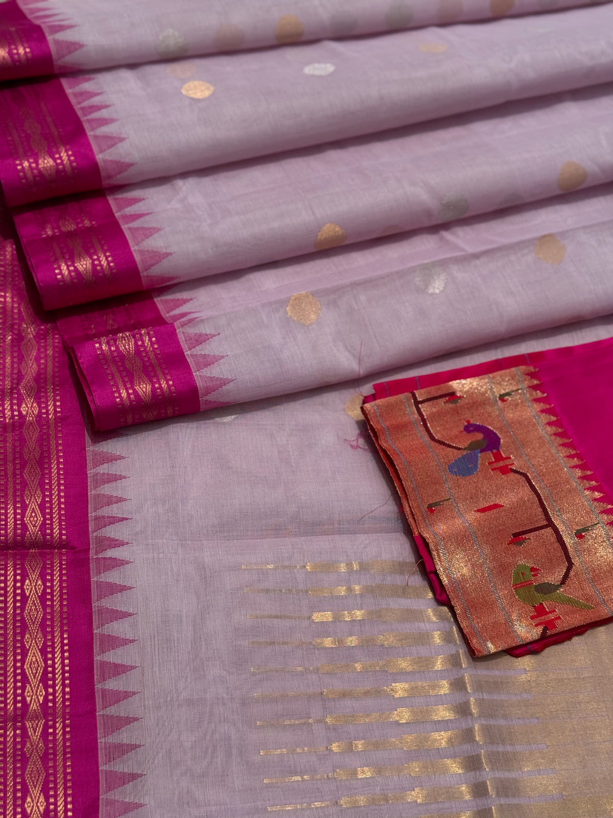 Handspun and handwoven ponduru Khadhi cotton jamdani saree with silk border in contrast pink and lilac jacquard weave