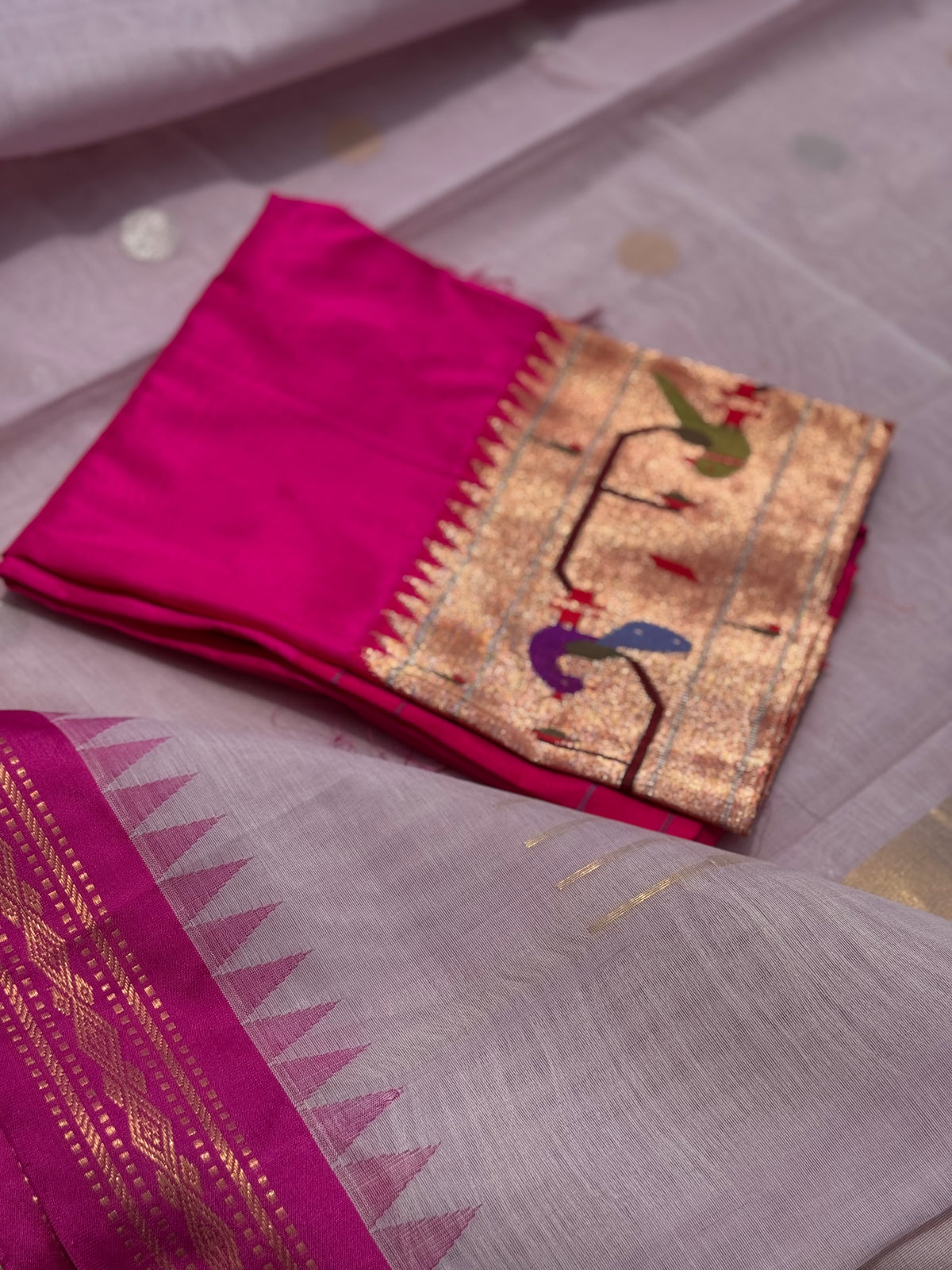Handspun and handwoven ponduru Khadhi cotton jamdani saree with silk border in contrast pink and lilac jacquard weave