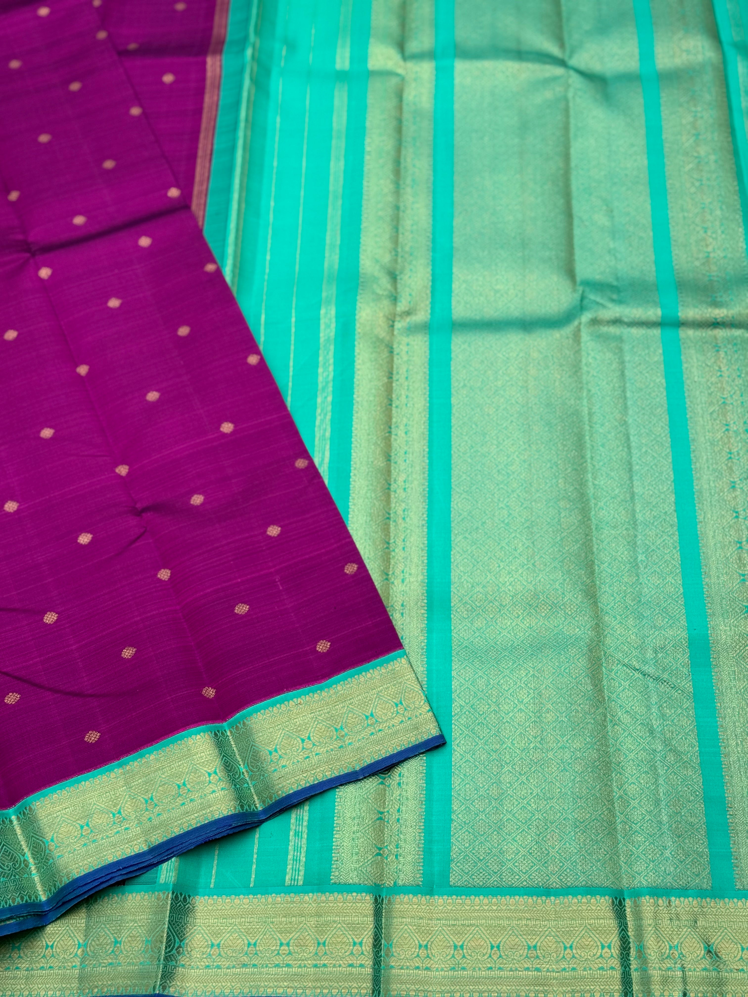 A Masterpiece kanchivaram korvai silk saree in deep plum pink with turquoise foam green