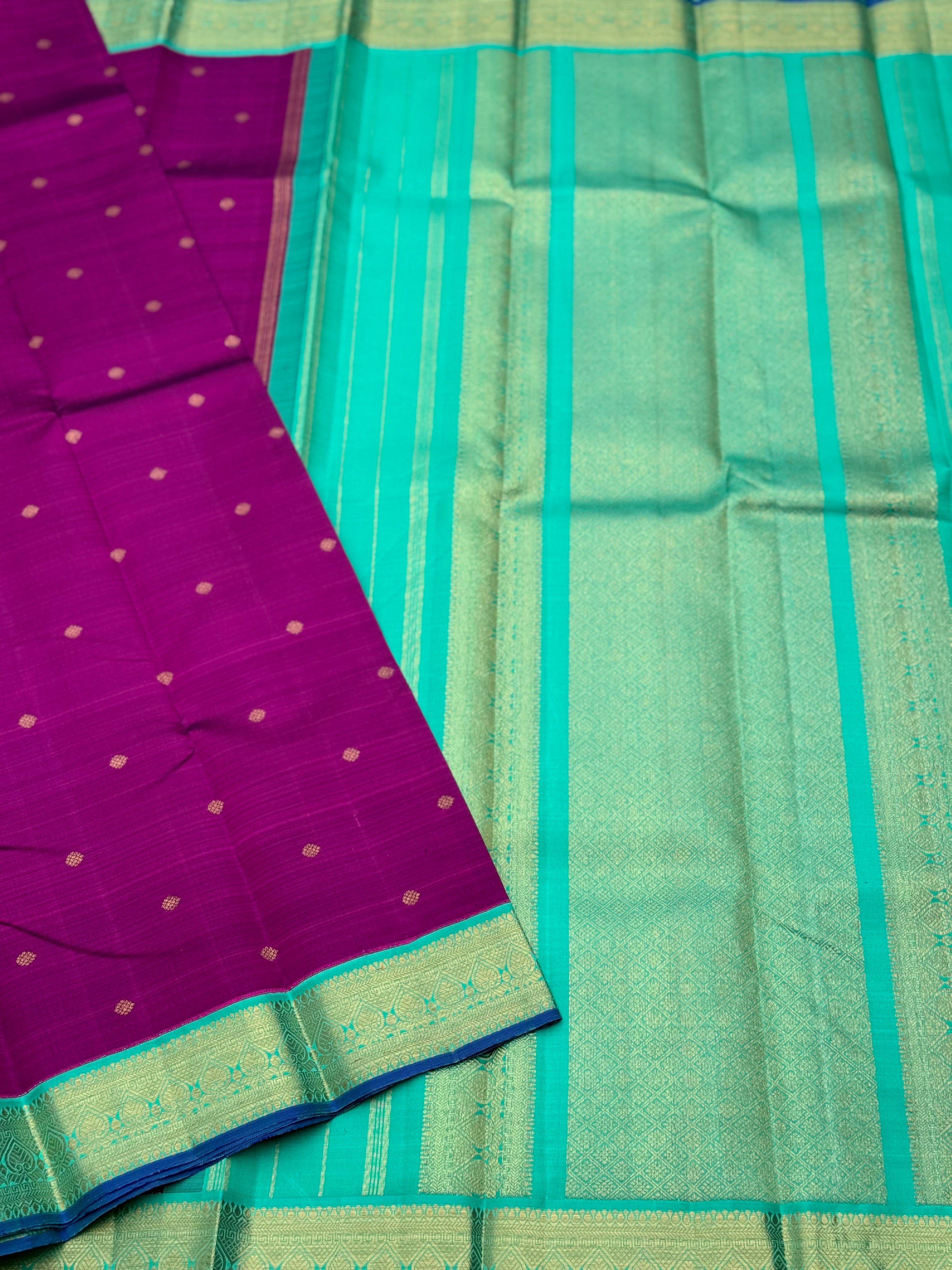 A Masterpiece kanchivaram korvai silk saree in deep plum pink with turquoise foam green