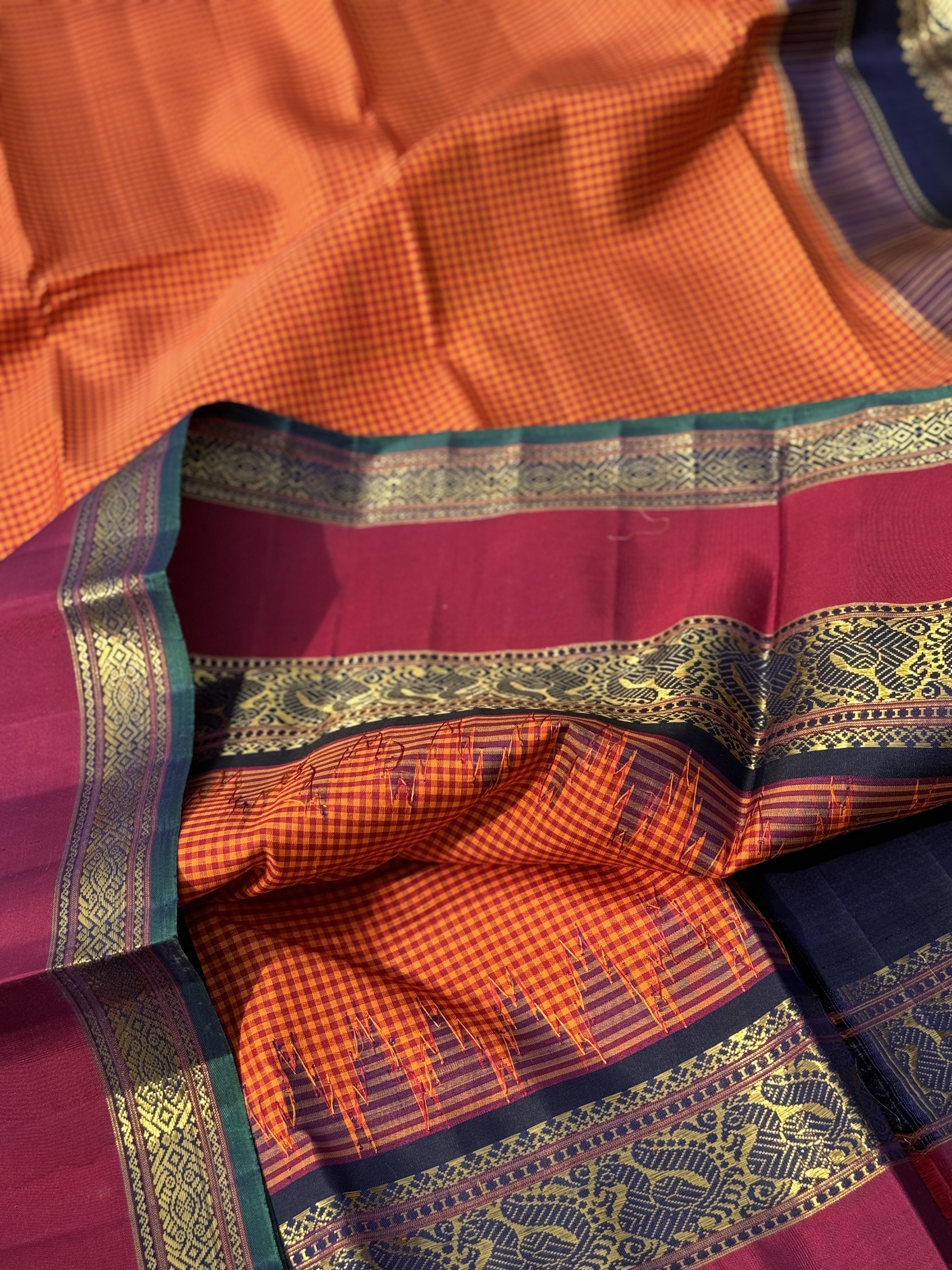 KADHAMBAM KANCHI - A grandeur burnt orange with deep navy blue korvai temple  and zari border kanchivaram silk SAREE