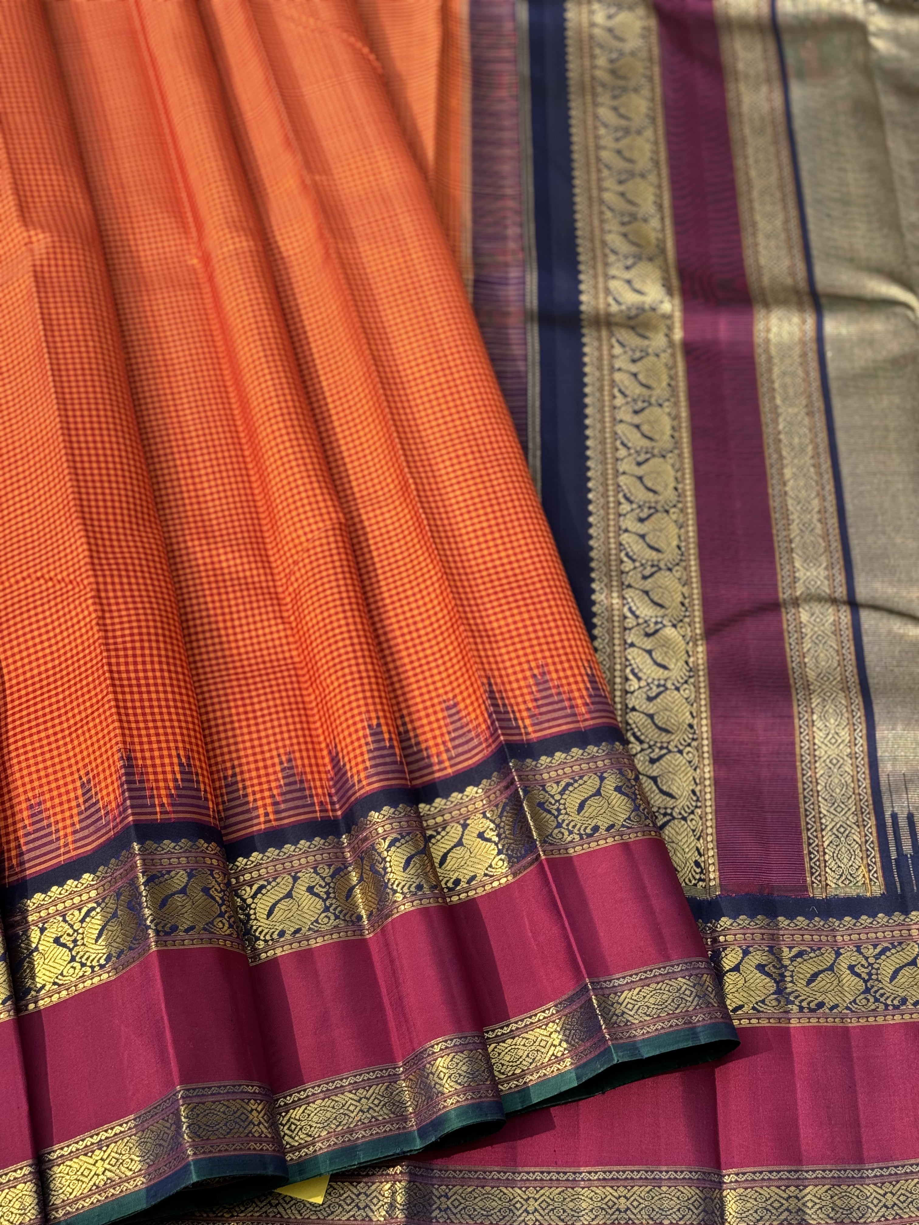 KADHAMBAM KANCHI - A grandeur burnt orange with deep navy blue korvai temple  and zari border kanchivaram silk SAREE