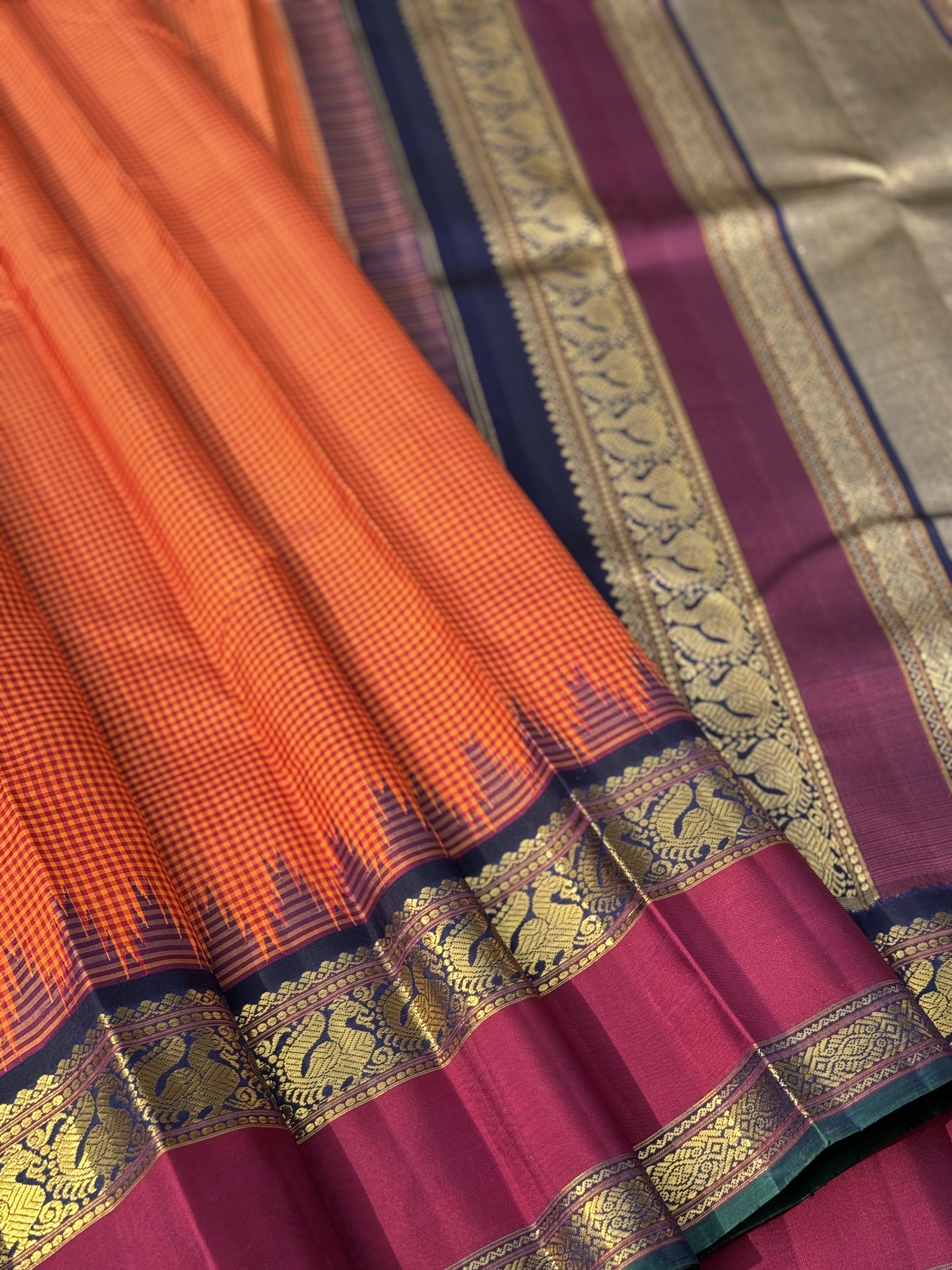 KADHAMBAM KANCHI - A grandeur burnt orange with deep navy blue korvai temple  and zari border kanchivaram silk SAREE