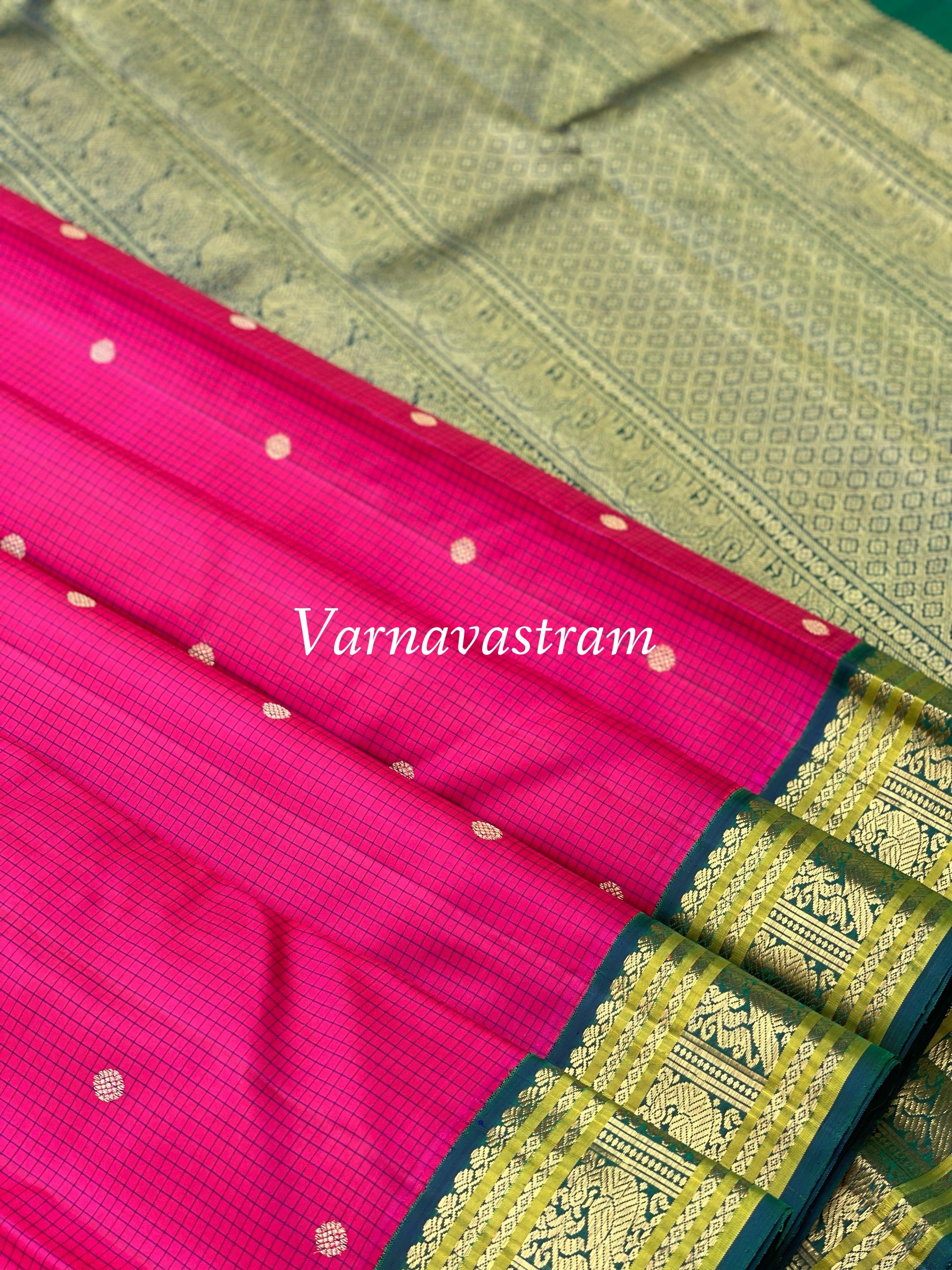 A Deep Fuchsia pink with green border Kanchivaram Silk saree