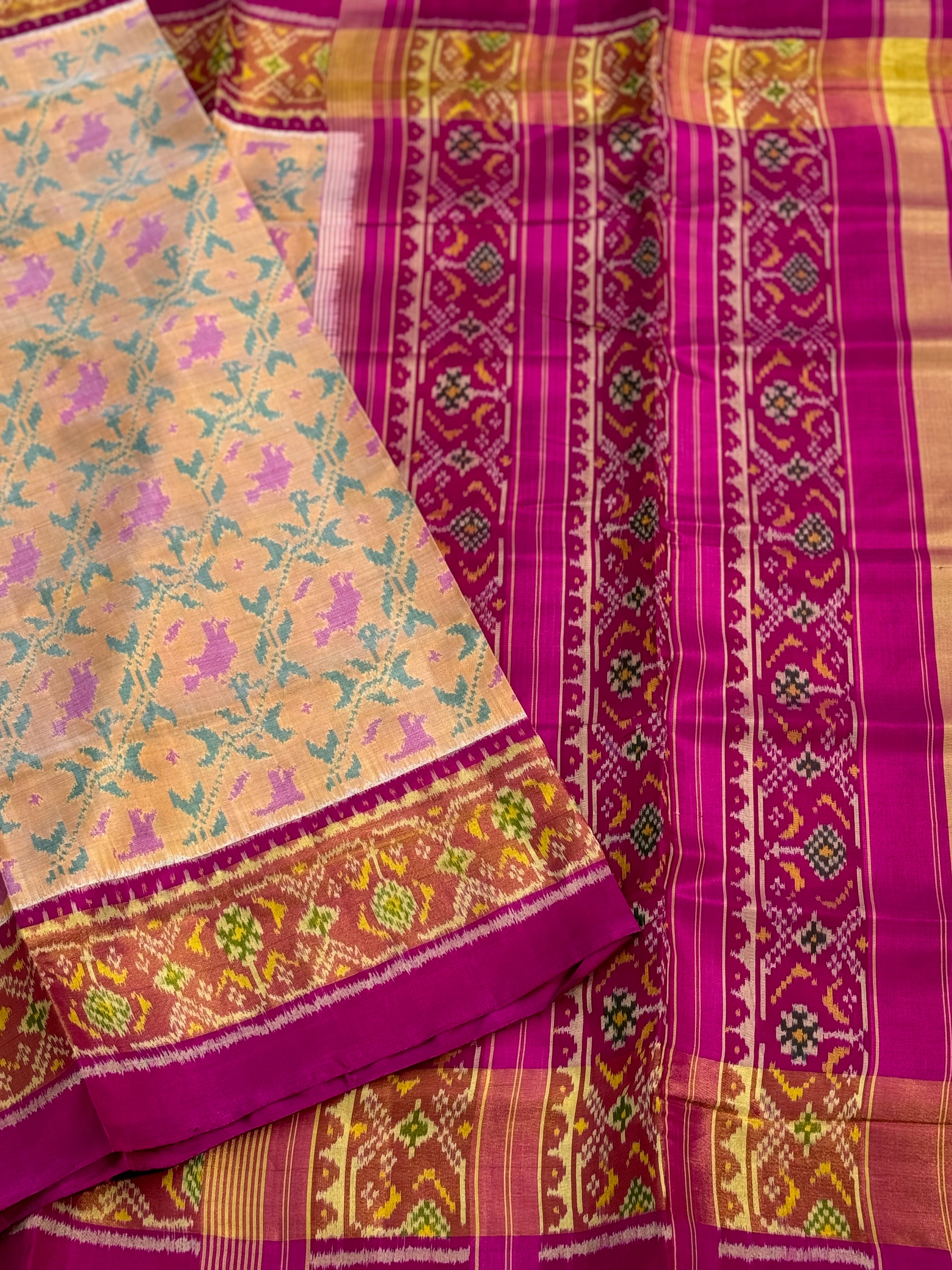 A gorgeous beige gold shade single ikkat patola silk SAREE