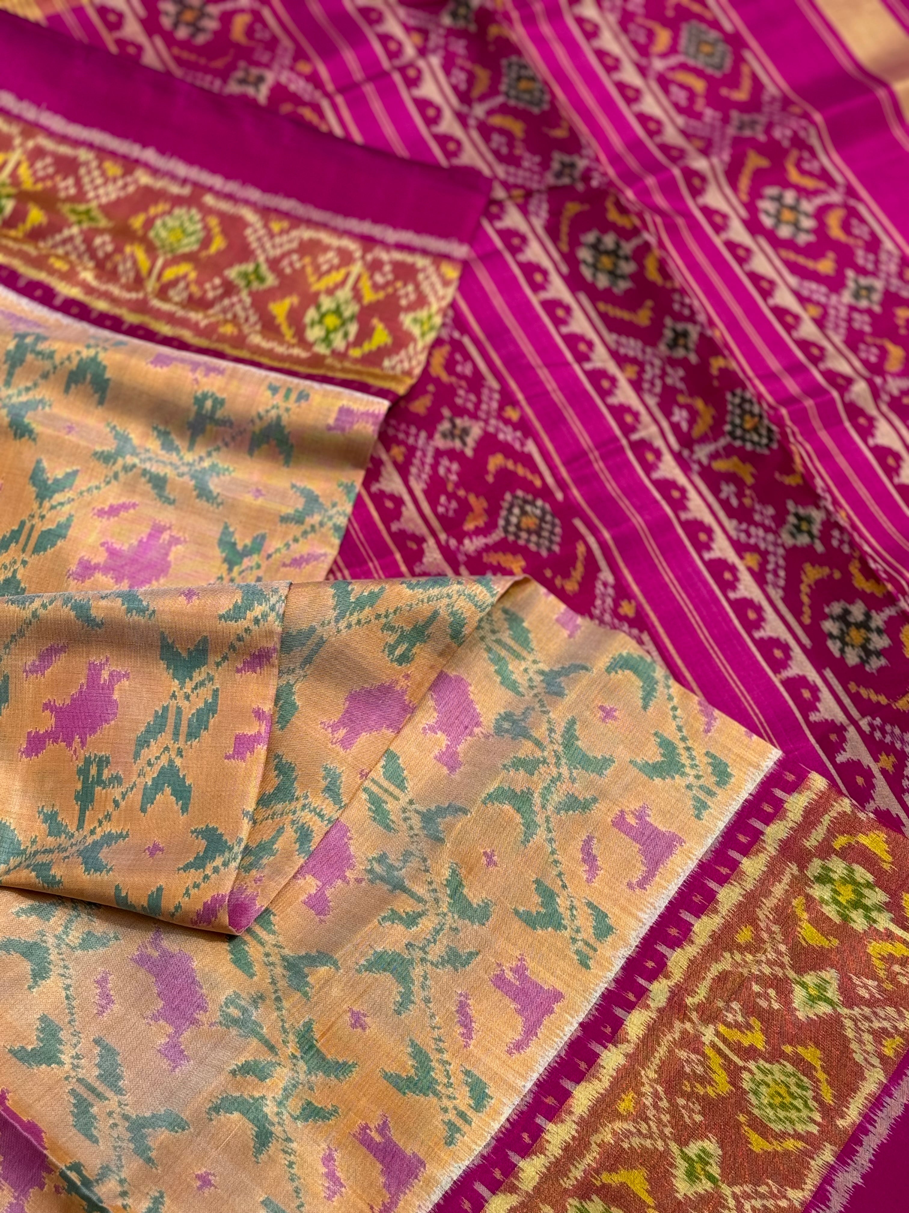 A gorgeous beige gold shade single ikkat patola silk SAREE