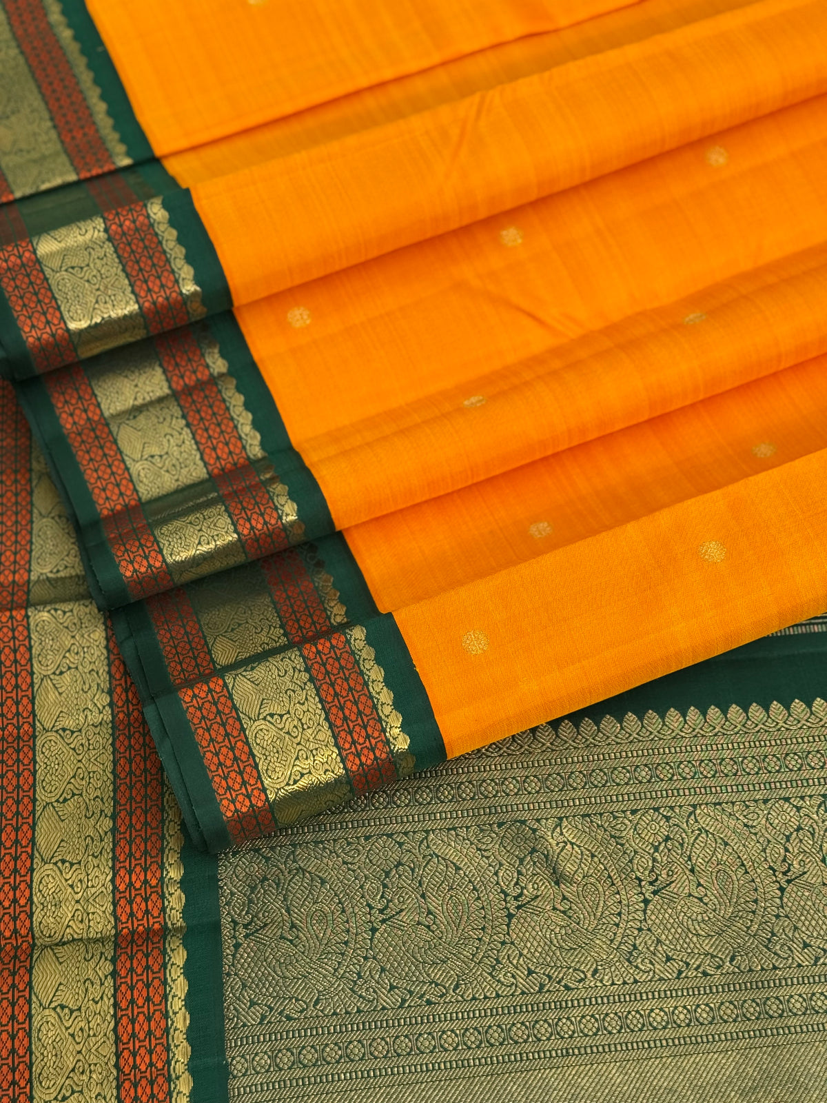 A Masterpiece kanchivaram korvai silk saree in mambazha yellow and bottle green