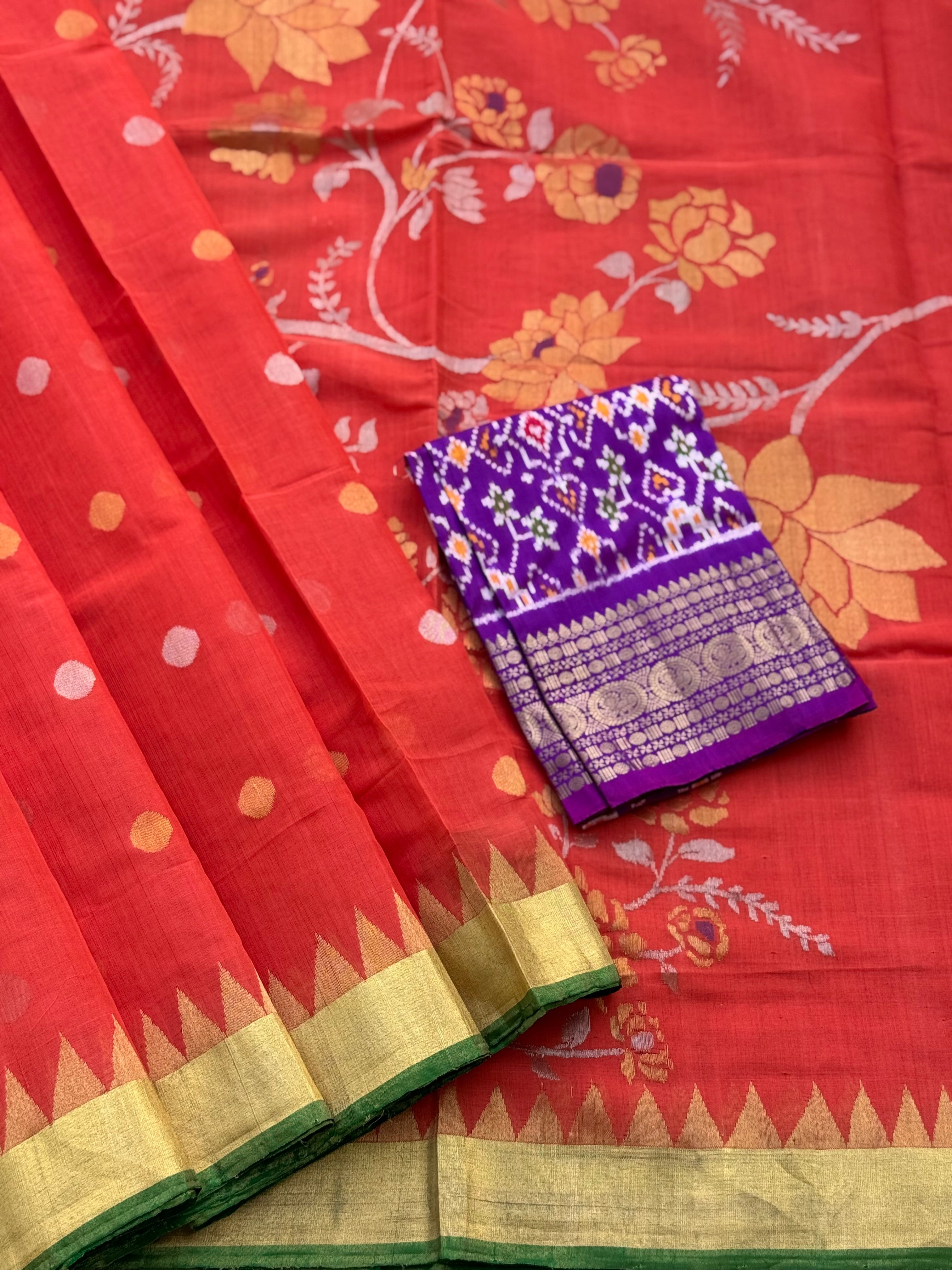 A gorgeous handspun ponduru Khadhi jamdani cotton saree in burnt orange