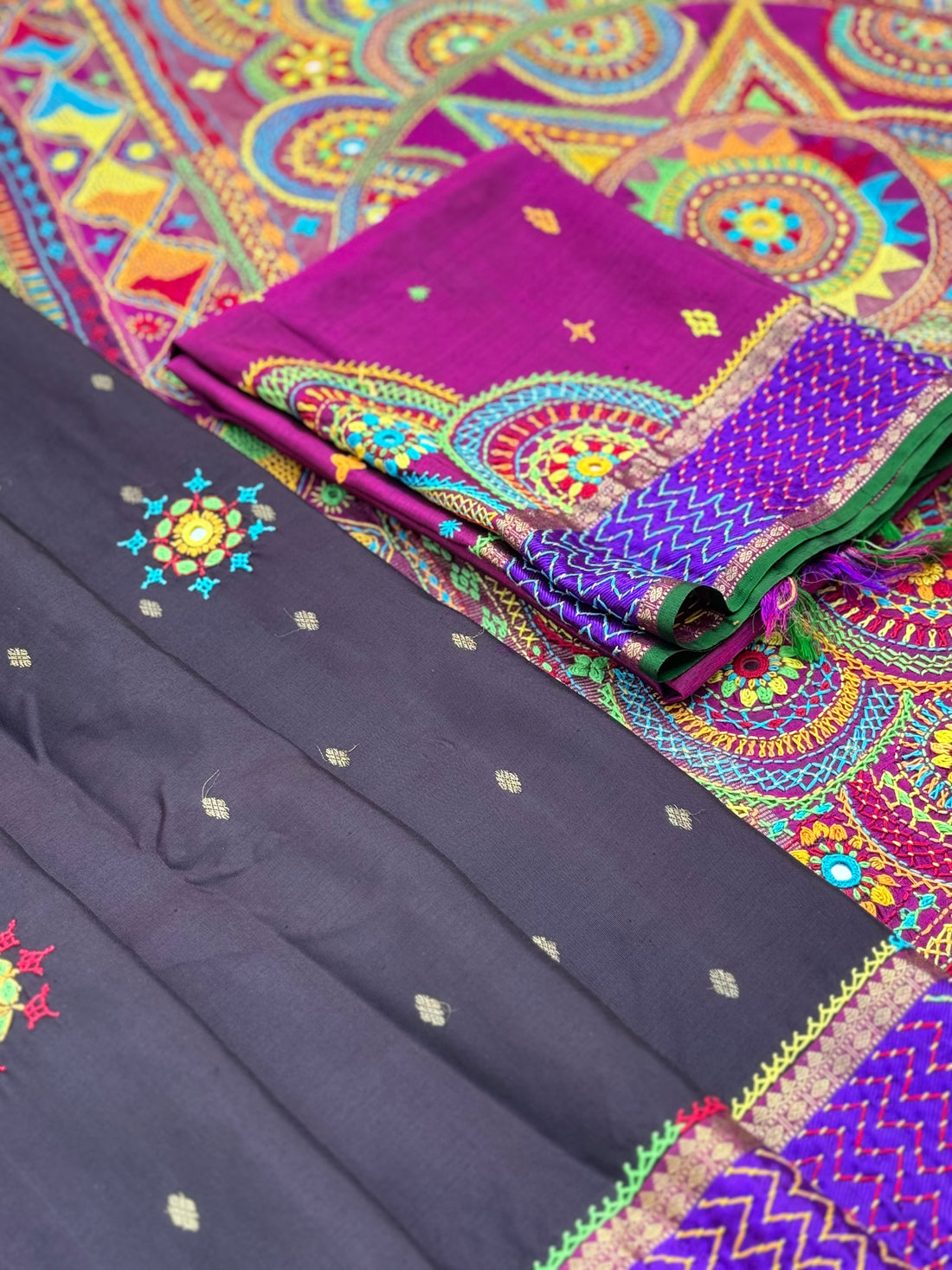 handwoven pure kanchivaram silk saree with korvai borders adorned with an exquisite handmade lambani mirror work