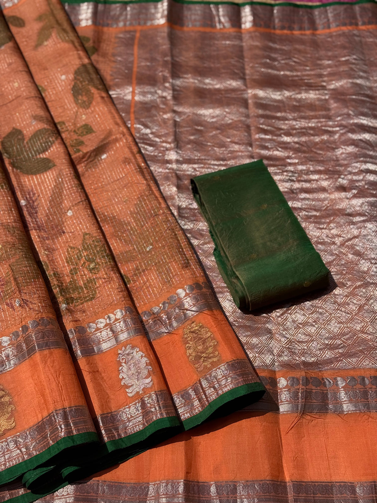 A pastel orange with shot fern green Natural Handmade Ecoprints Gadwal silk saree