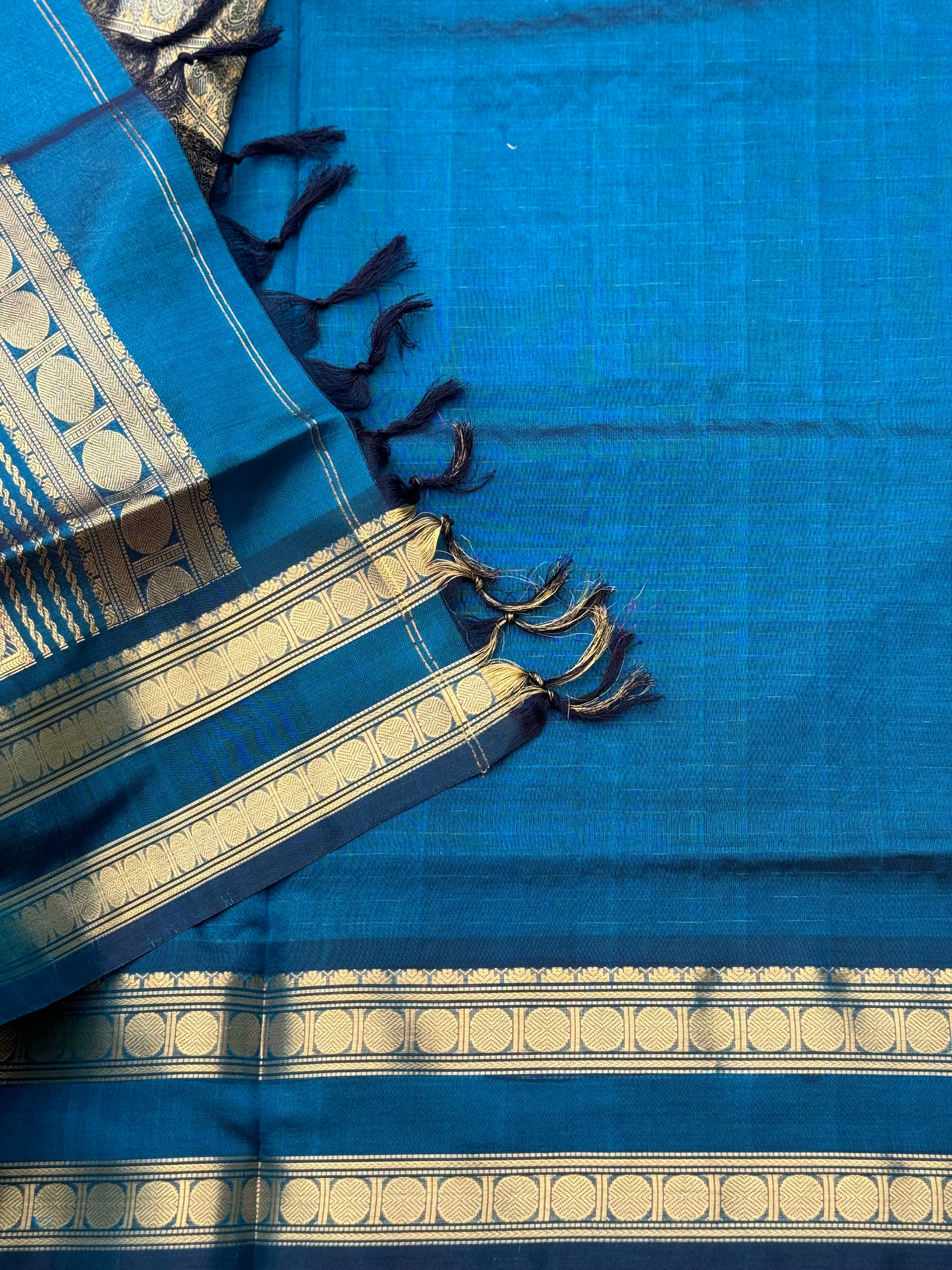 A gorgeous peacock blue shade handwoven zari checks with deer motifs Kanchi silk cotton saree