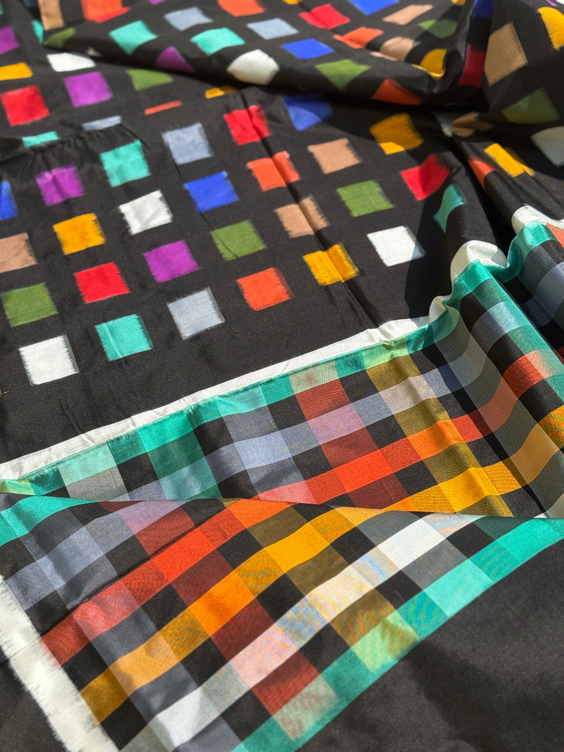 A contemporary take on solid block pattern multicolour double ikkat silk saree