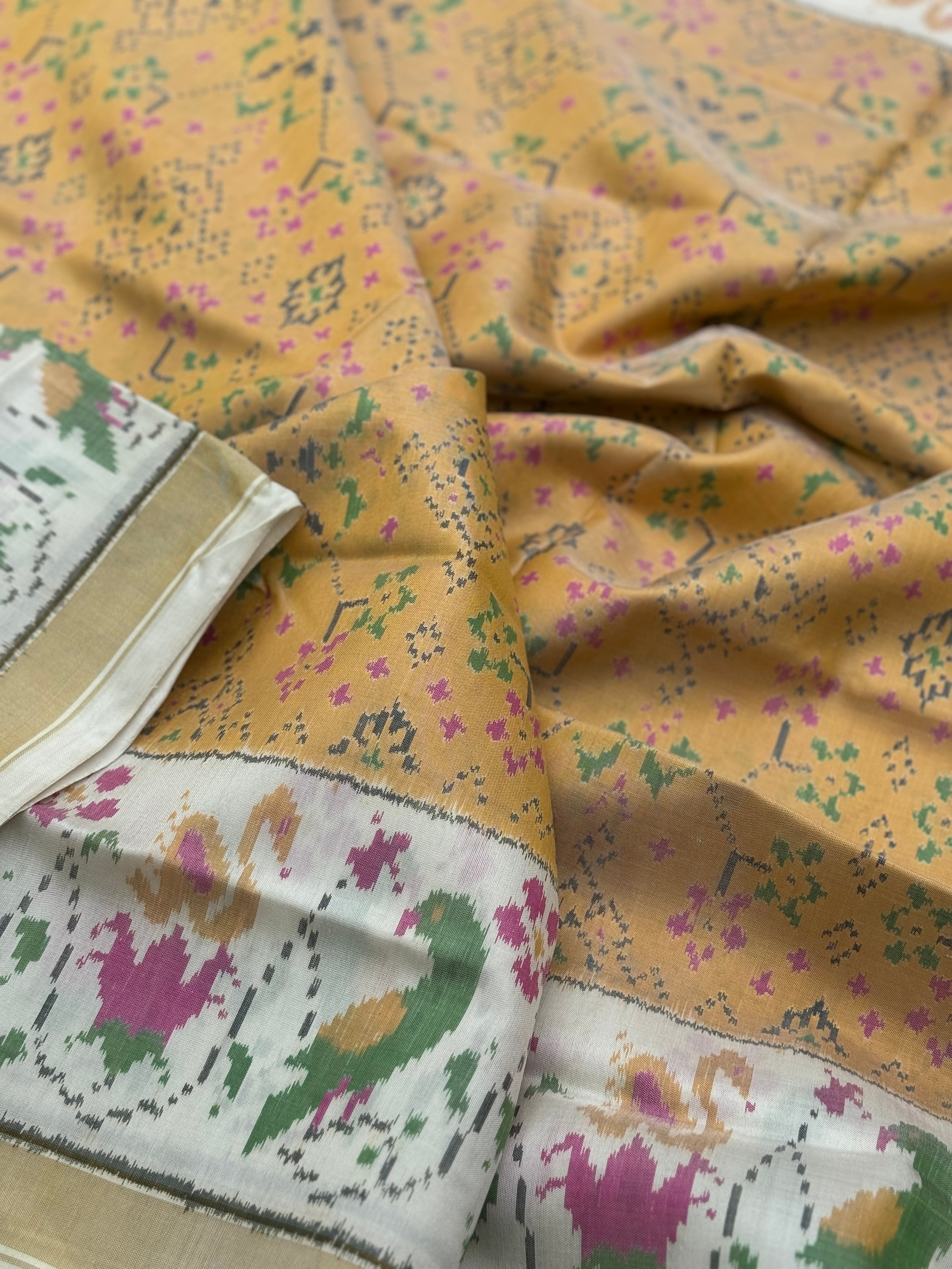 muted gold with ivory Patola single ikkat silk saree