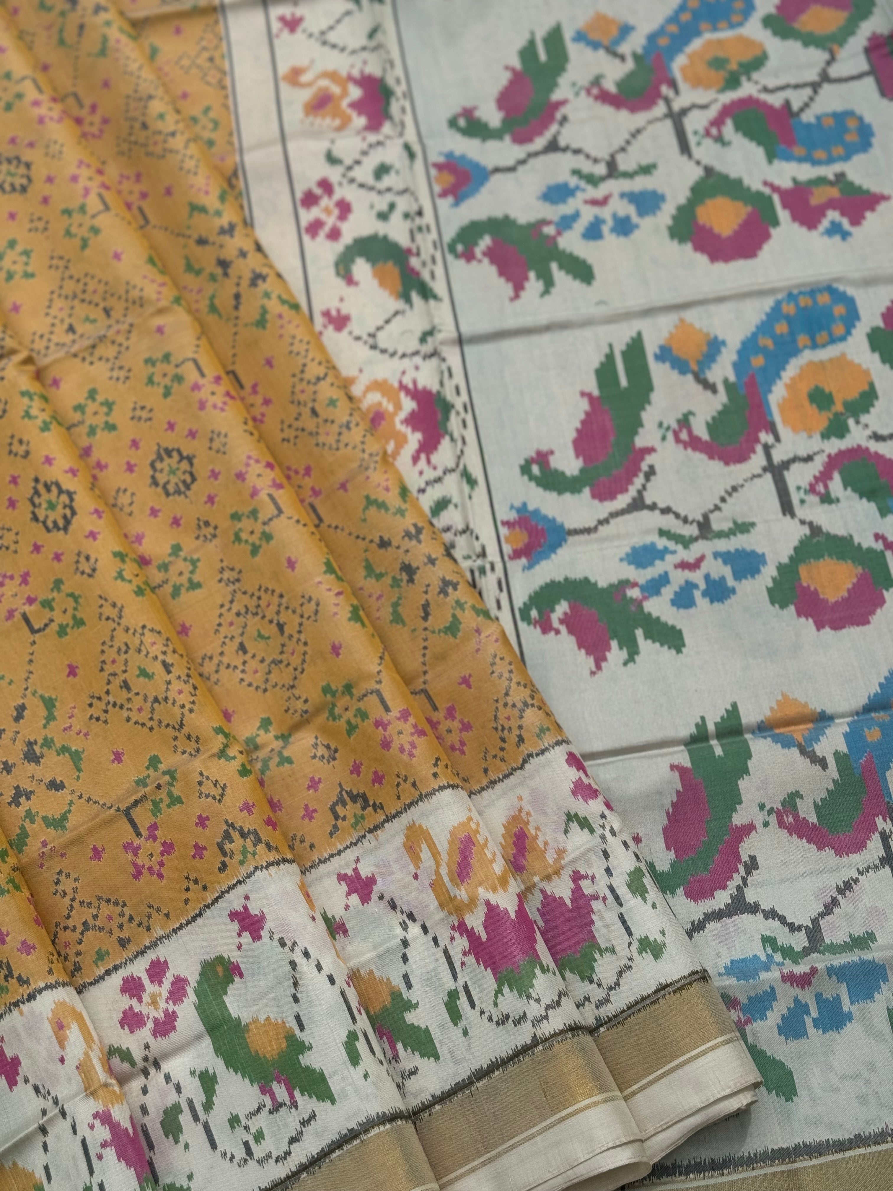 muted gold with ivory Patola single ikkat silk saree