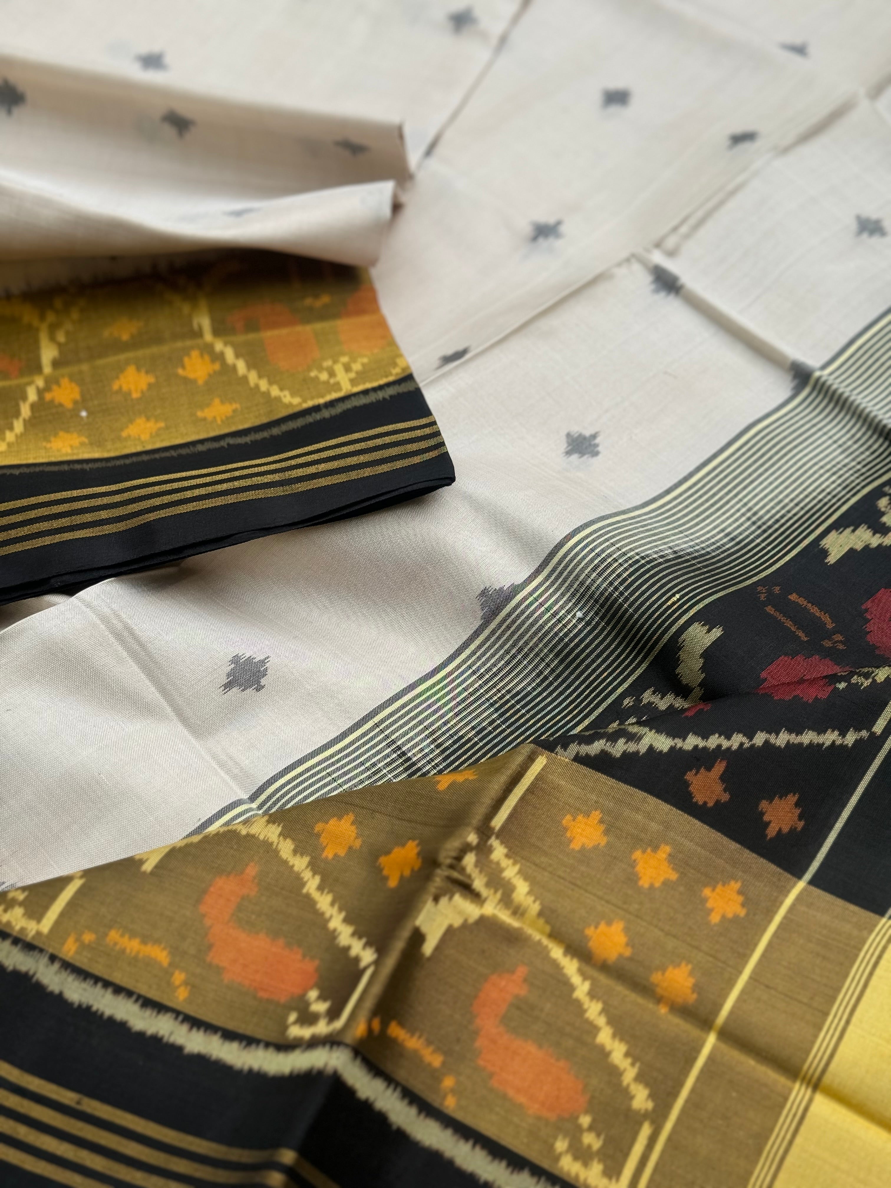 Ivory with black Patola single ikkat silk saree