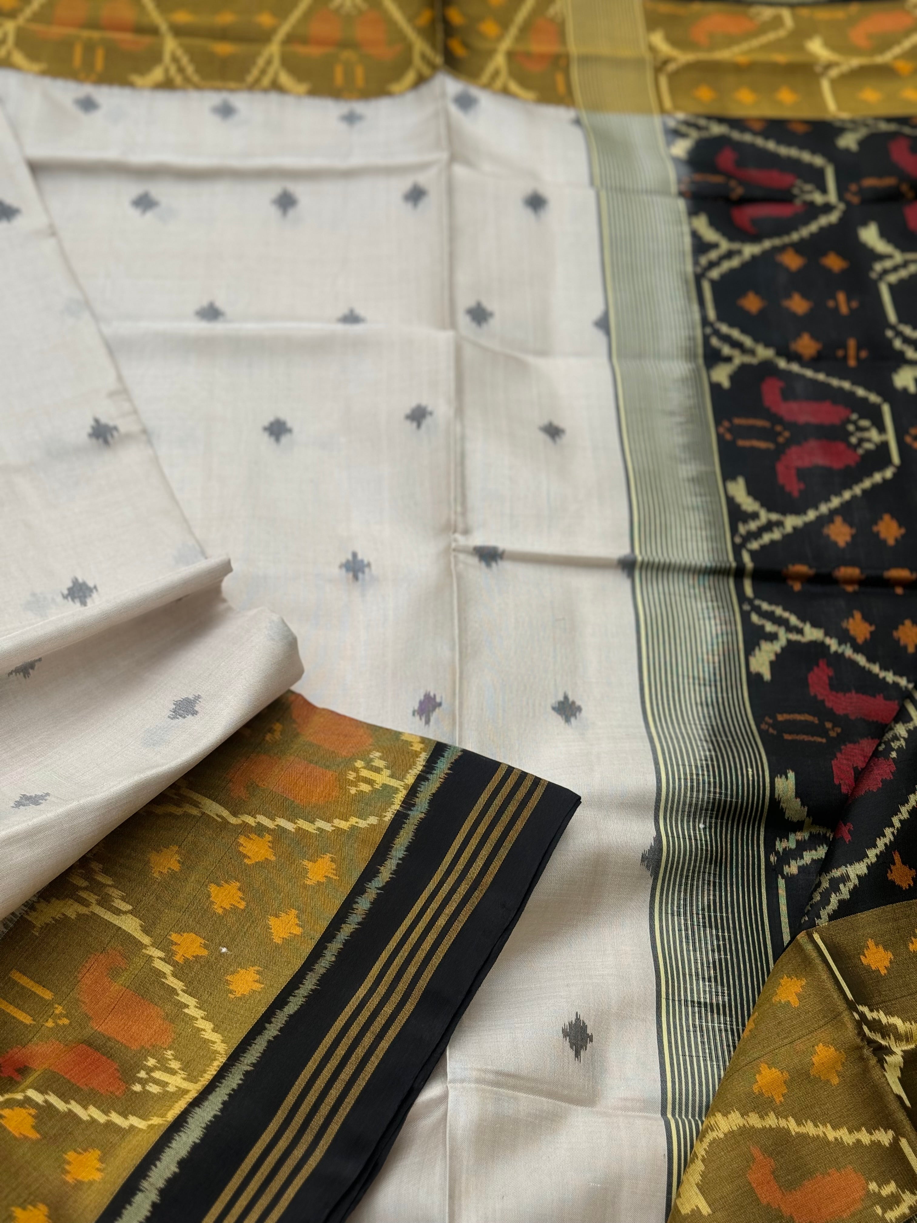 Ivory with black Patola single ikkat silk saree