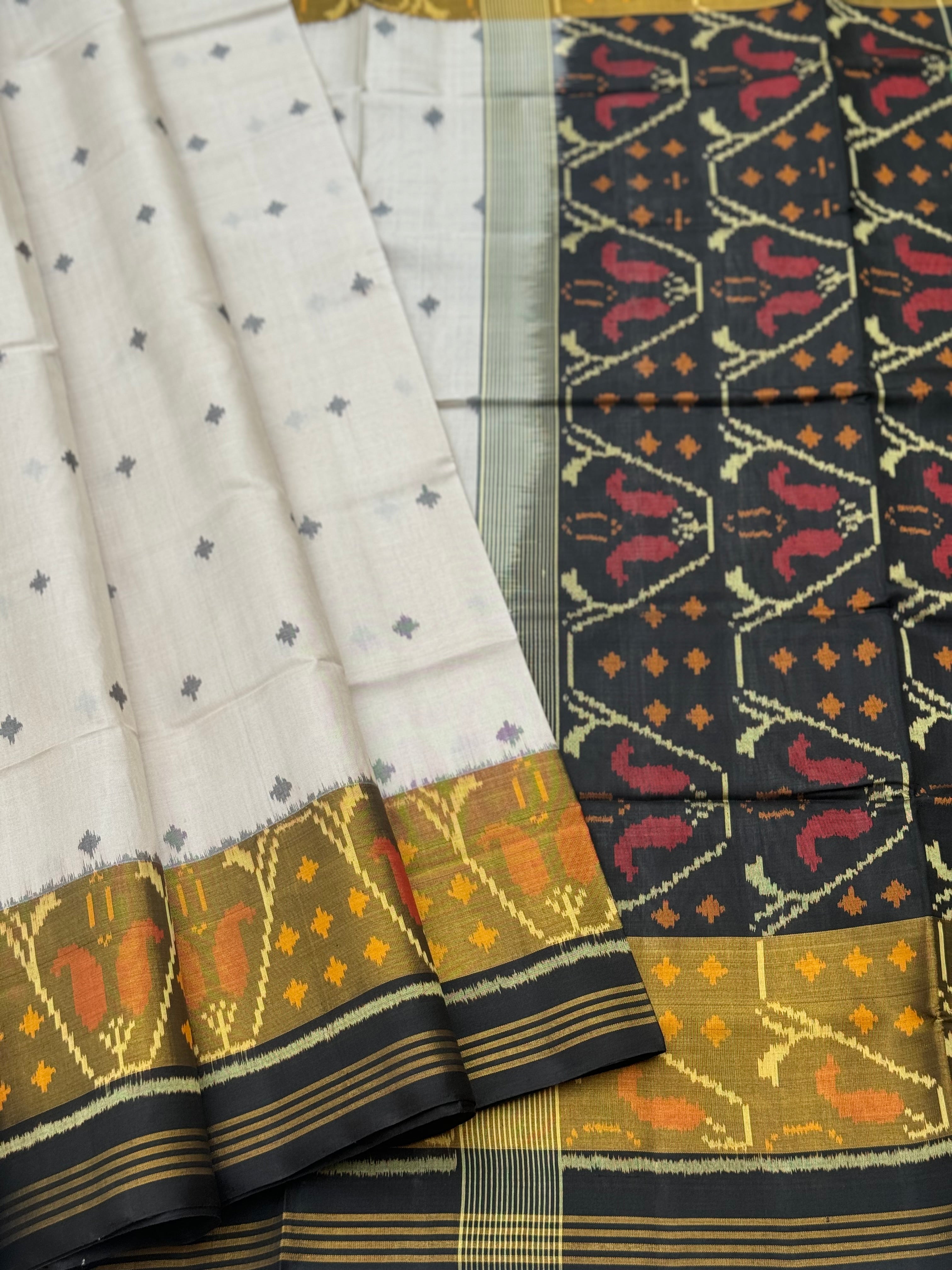 Ivory with black Patola single ikkat silk saree