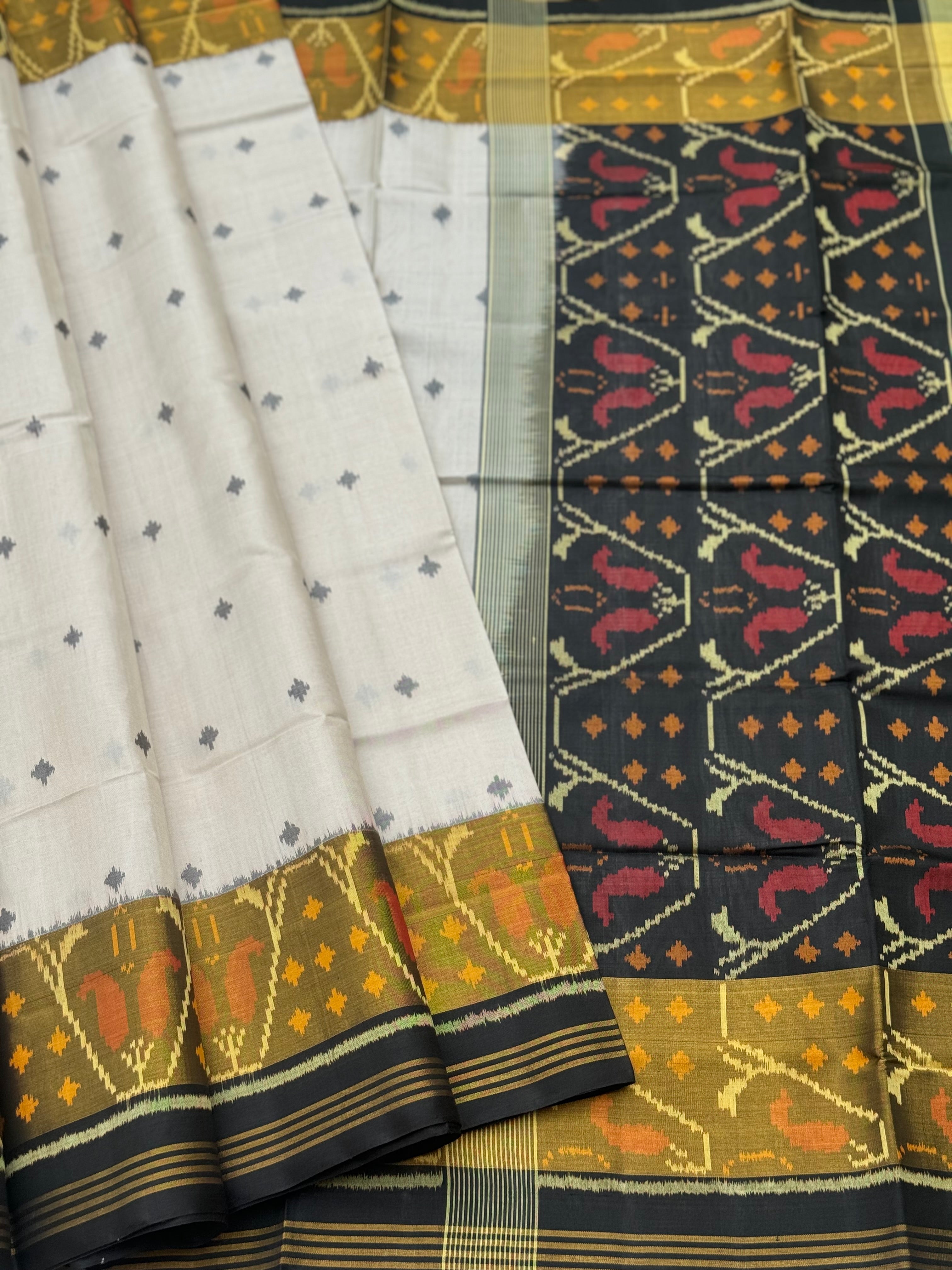 Ivory with black Patola single ikkat silk saree