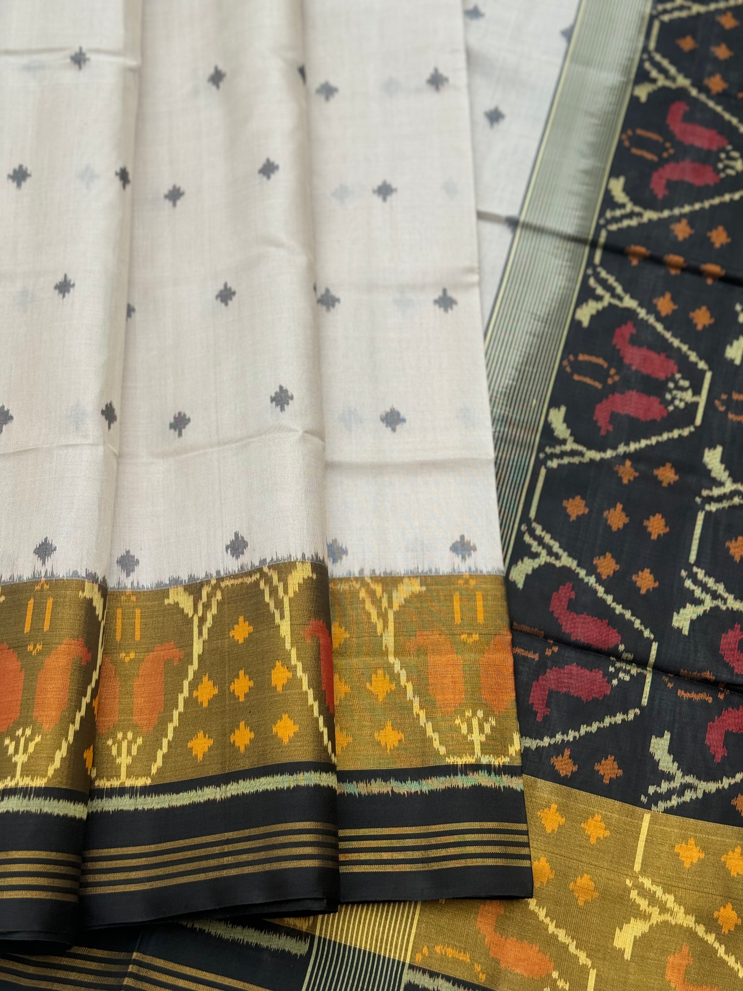 Ivory with black Patola single ikkat silk saree