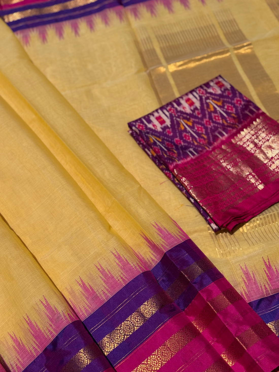 Handspun and handwoven ponduru Khadhi cotton saree with silk dobby border in contrast pink with purple