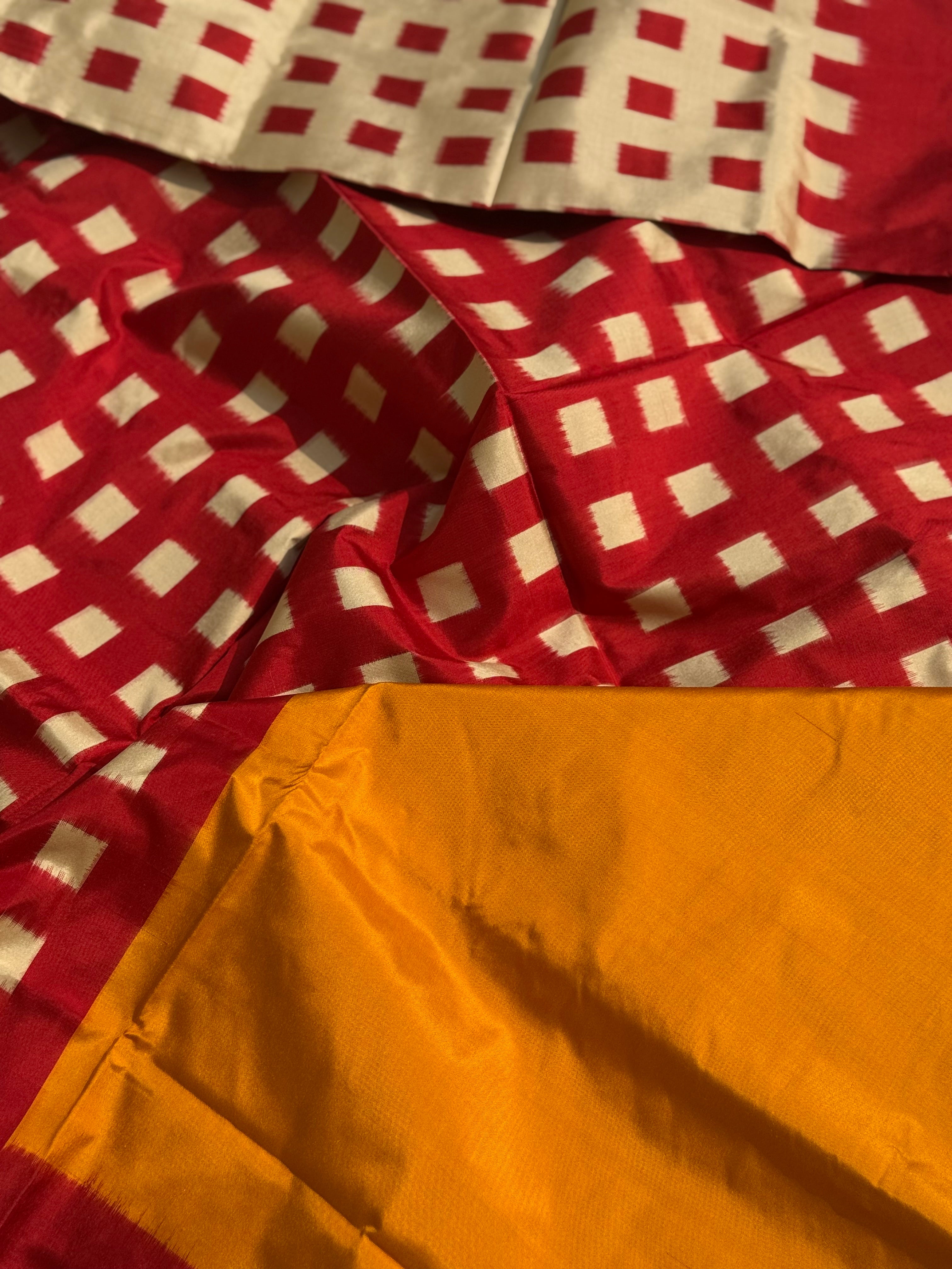 A contemporary take on solid block pattern double ikkat handwoven mulberry silk saree