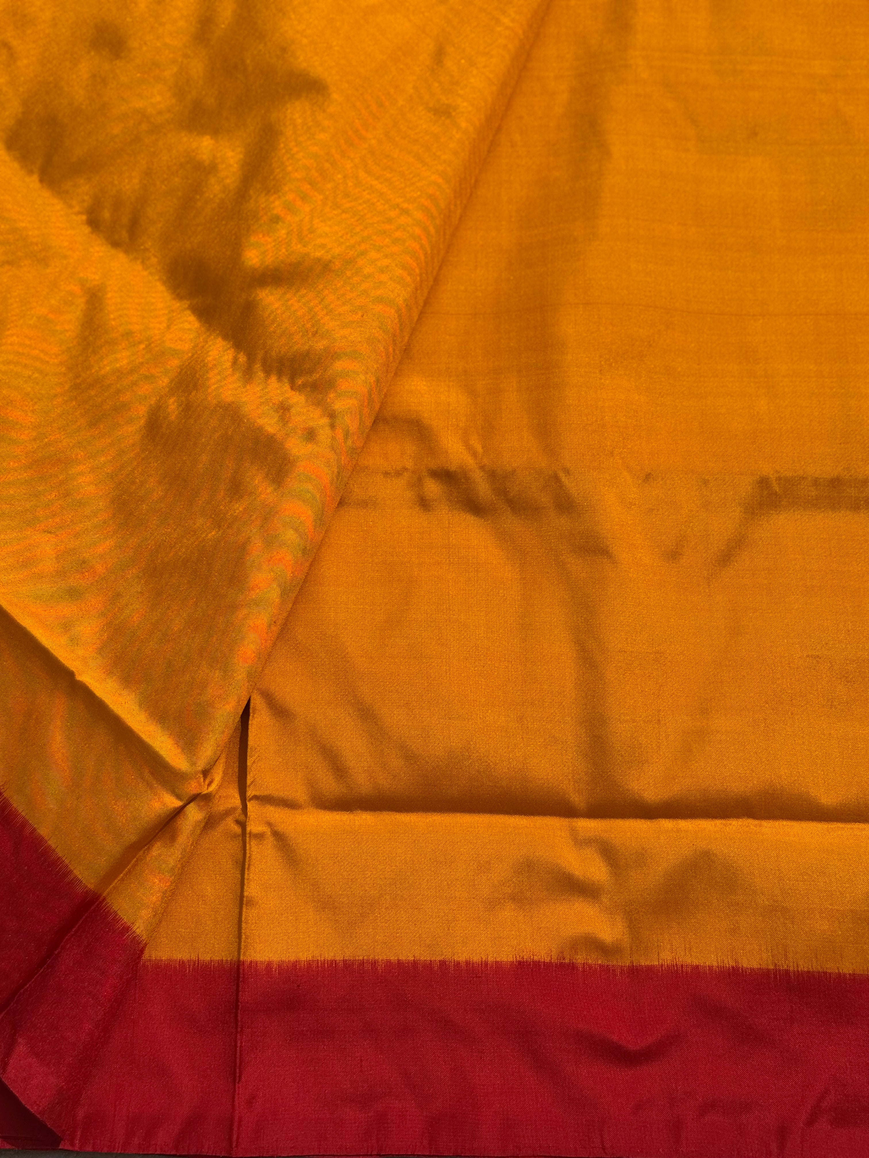 A contemporary take on solid block pattern double ikkat handwoven mulberry silk saree