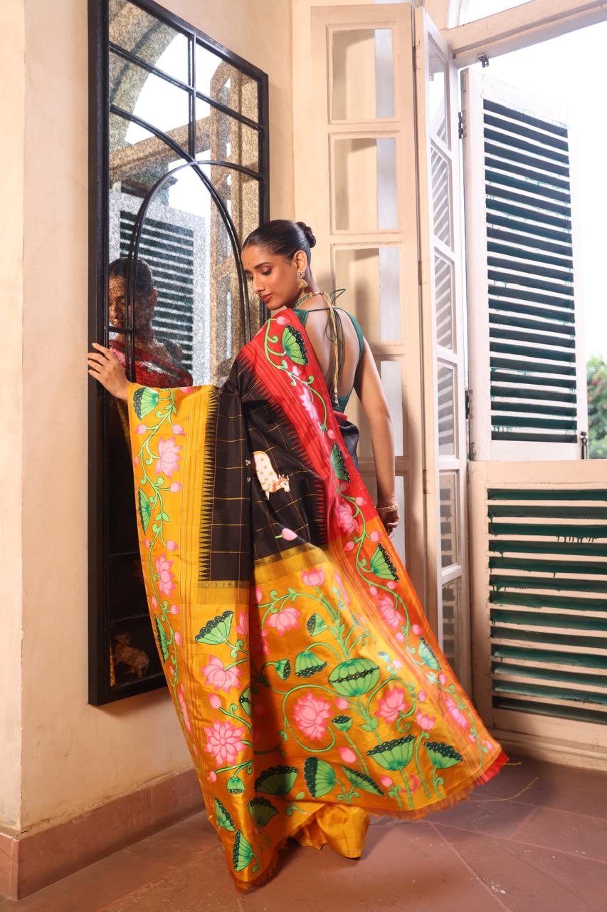 An elegant fusion crafted kanchivaram korvai silk With Pichwai hand painted art