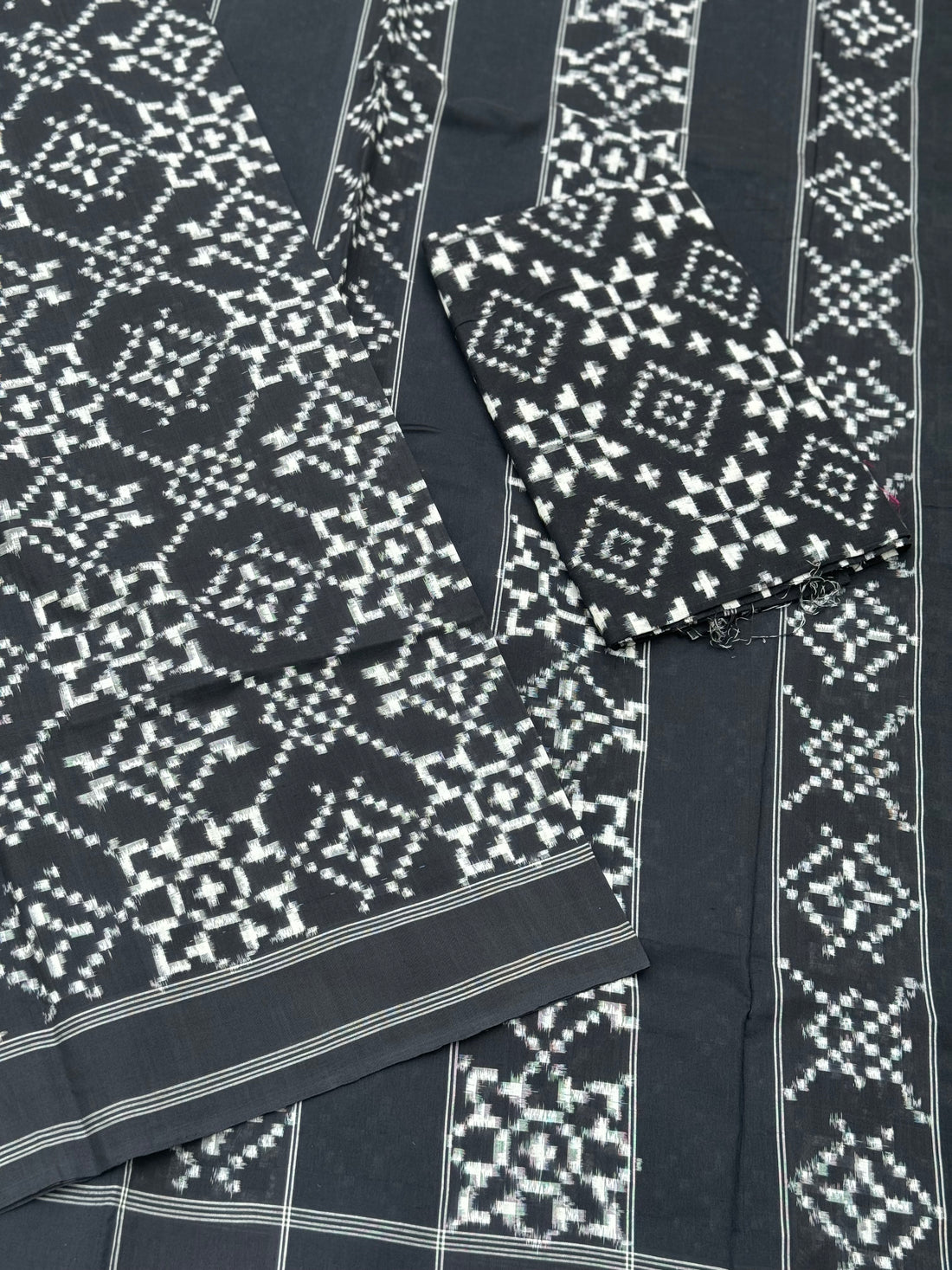 Black and white floral Telia Rumal double ikkat cotton saree