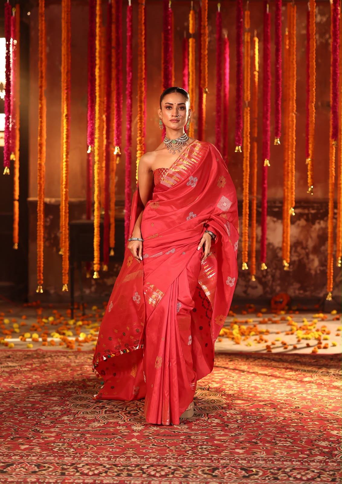 A designer exclusive Chilli Red shade ettukol kanchivaram silk saree with kasuti hand embroidery