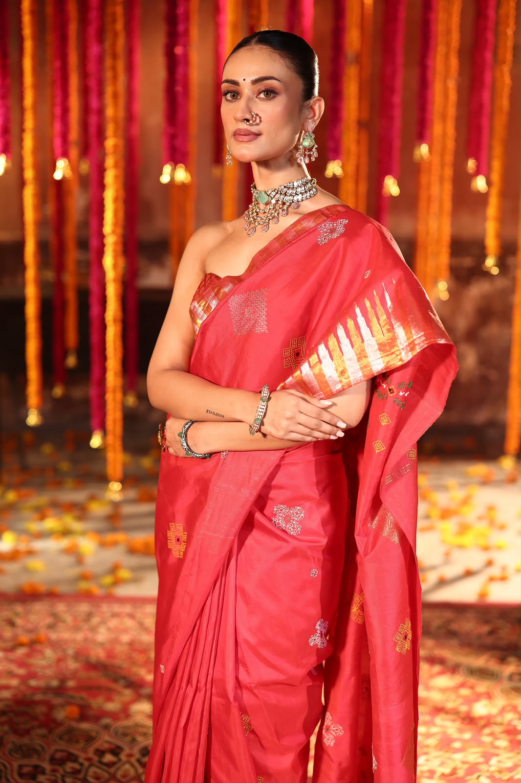 A designer exclusive Chilli Red shade ettukol kanchivaram silk saree with kasuti hand embroidery