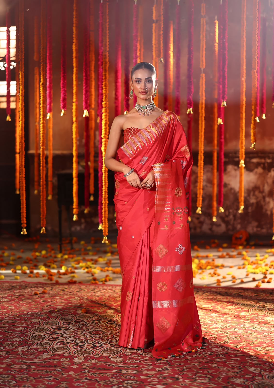 A designer exclusive Chilli Red shade ettukol kanchivaram silk saree with kasuti hand embroidery