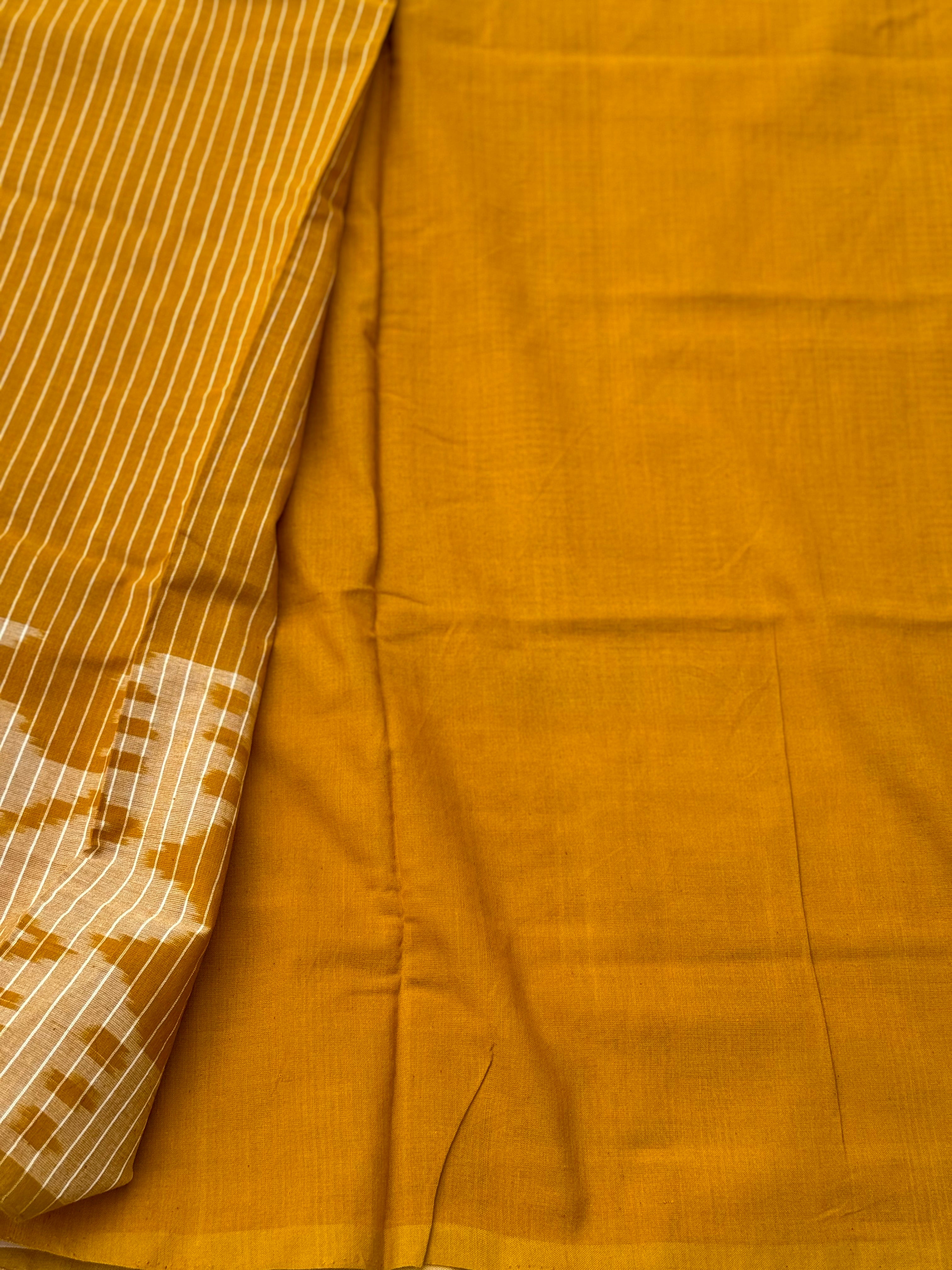 Mustard yellow single ikkat cotton saree