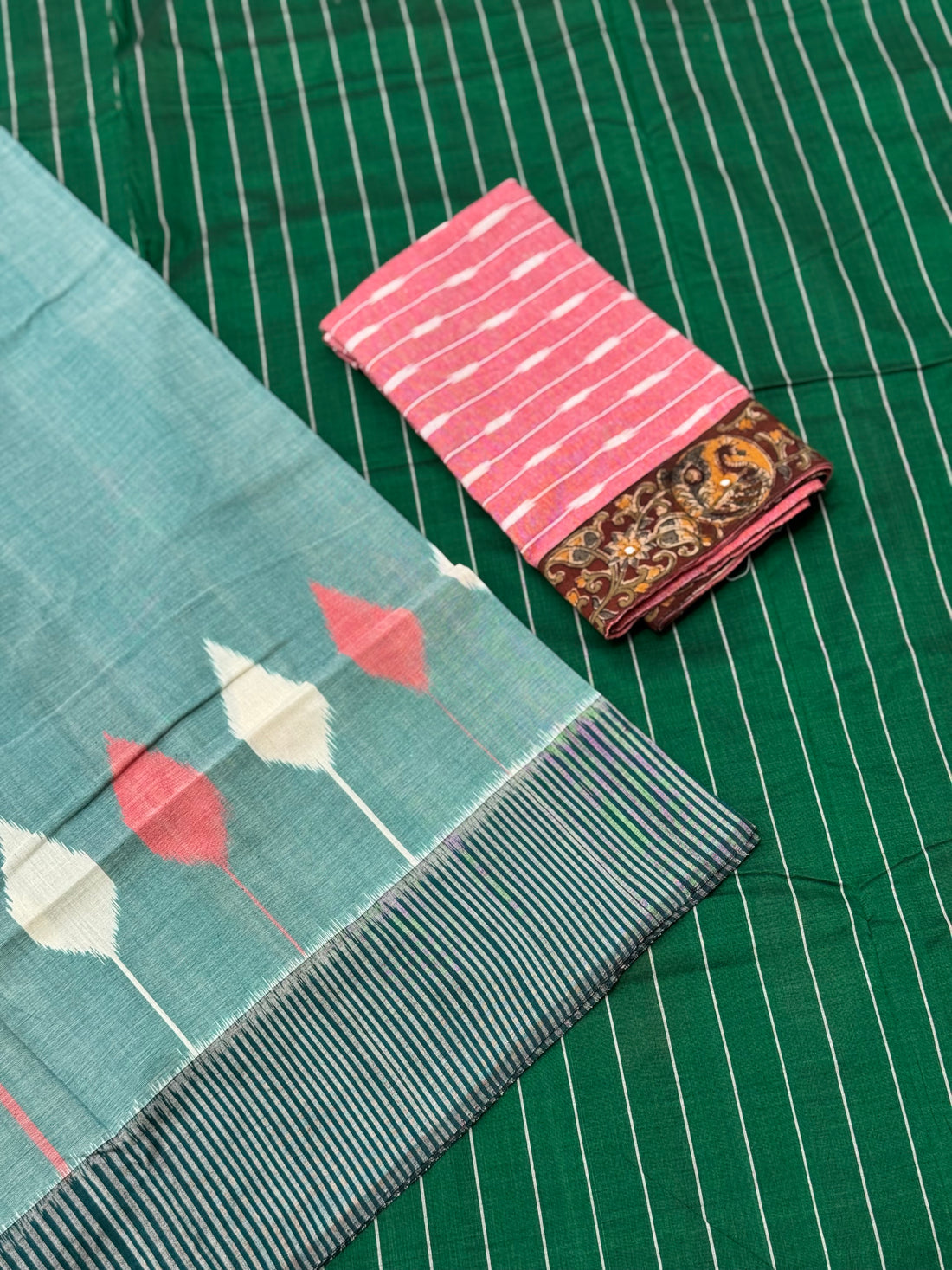 Teal green white handwoven weft single ikkat cotton saree