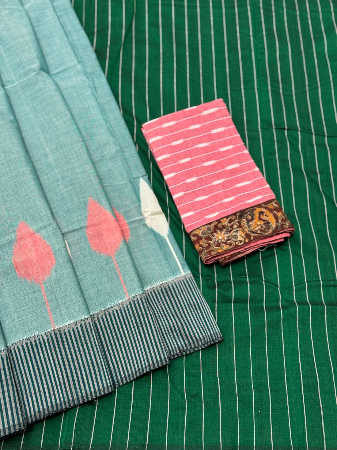 Teal green white handwoven weft single ikkat cotton saree