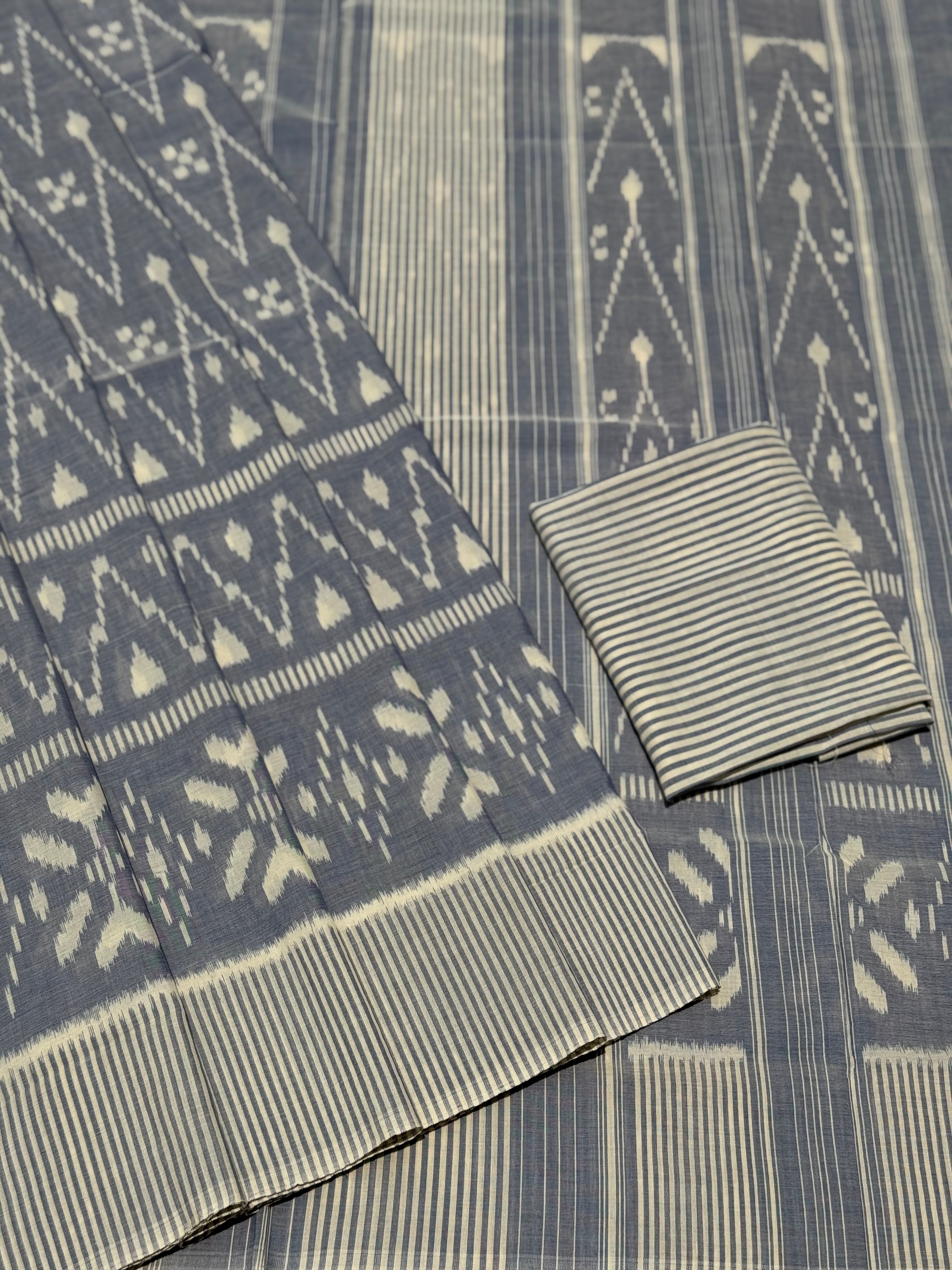 Ivory with powder blue handwoven weft single ikkat cotton saree