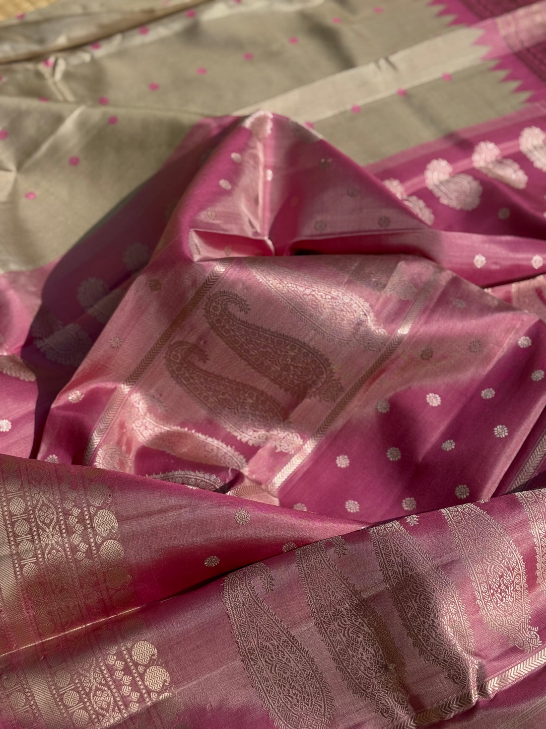 A soft and lustrous Handwoven kuttu gadwal silk saree in purple with red