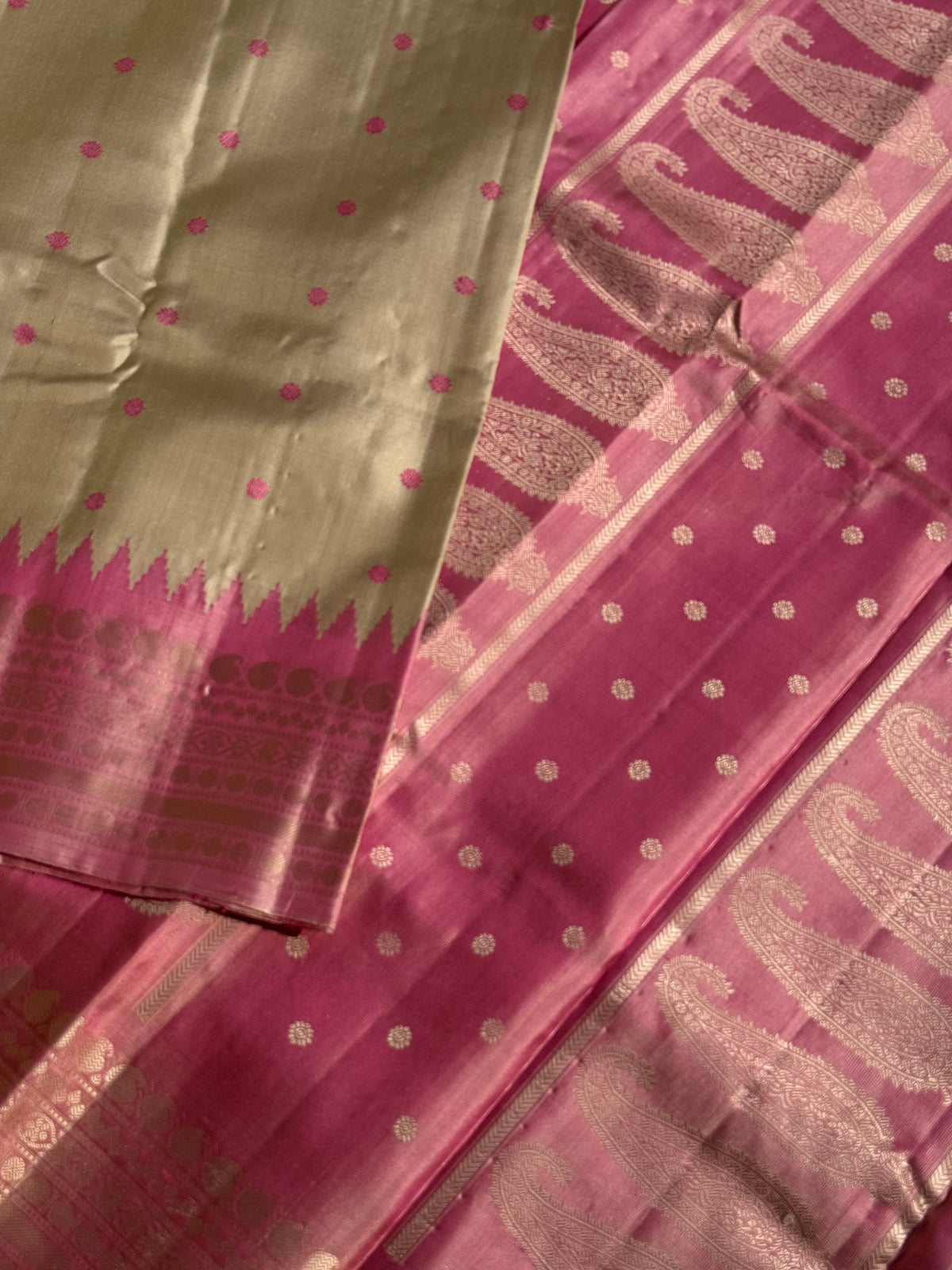 A soft and lustrous Handwoven kuttu gadwal silk saree in purple with red