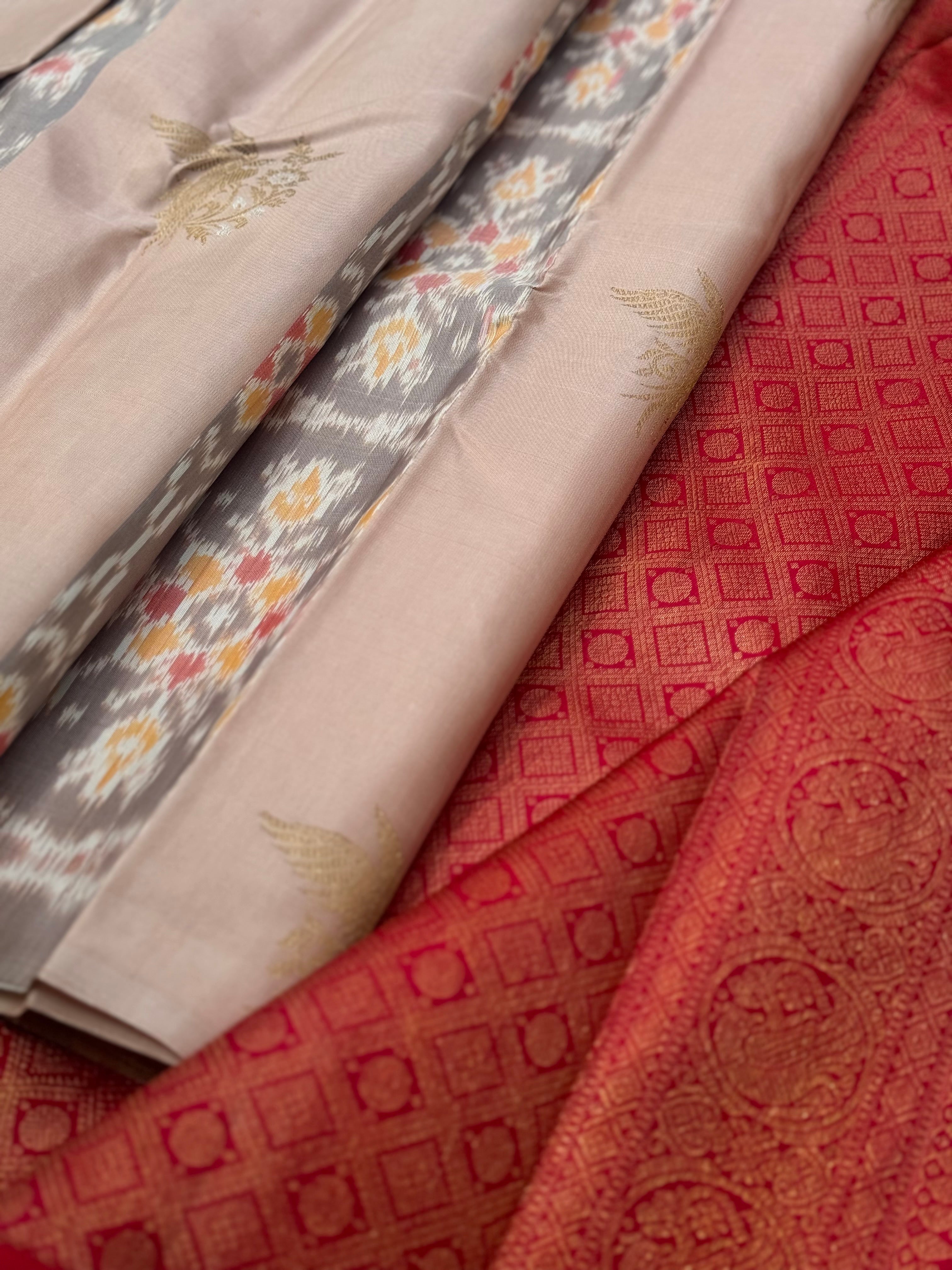 A gorgeous ovaltine shade with deep red kanchivaram borderless silk saree