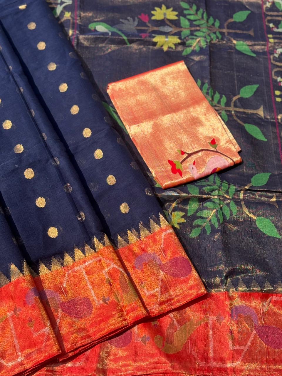 A Designer Exclusive Jaal Weave Ponduru Khadhi Jamdani with tissue Muniya paithani border with Peacock and Parrots