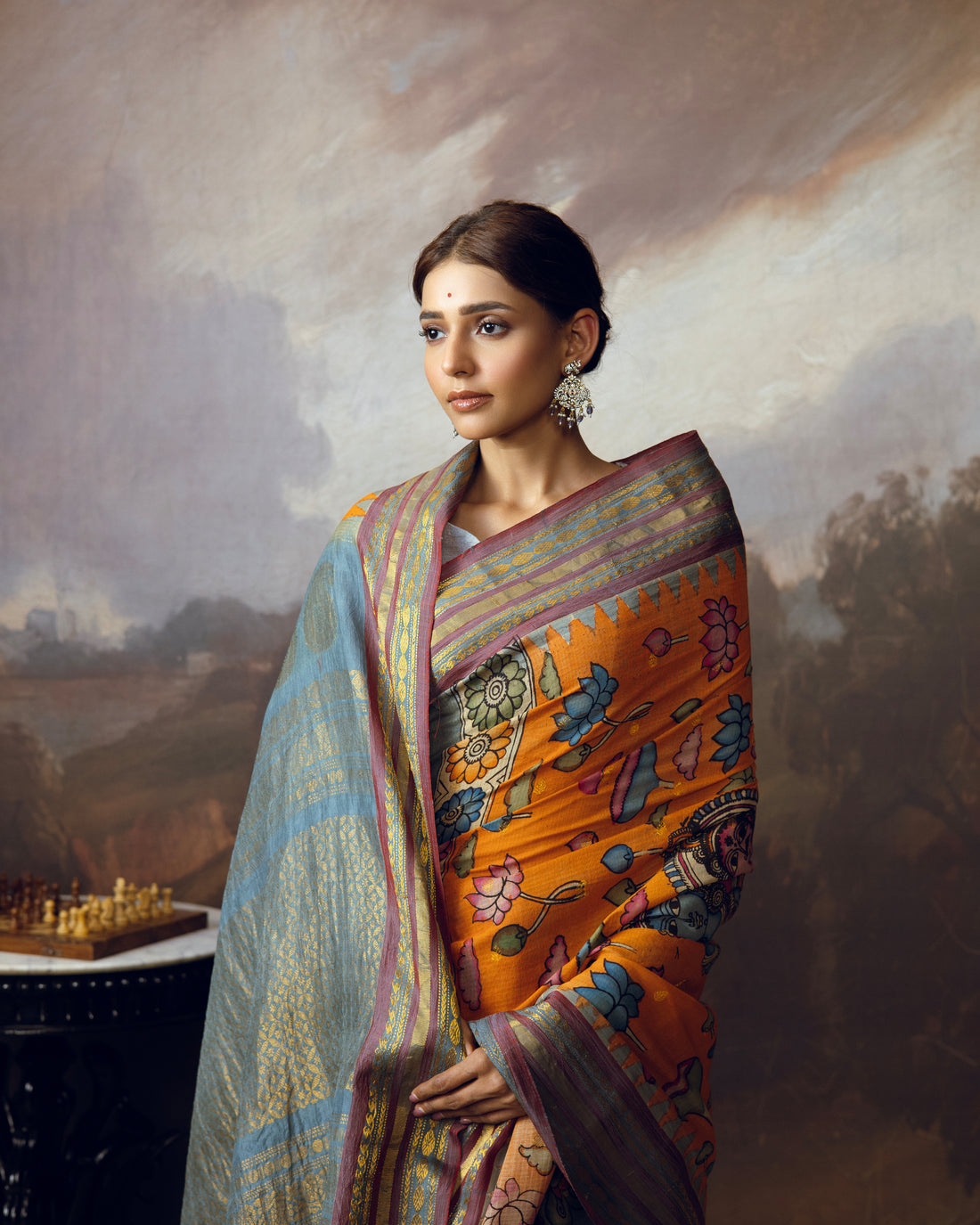 Handdrawn handpainted penkalamkari on silk cotton gadwal saree